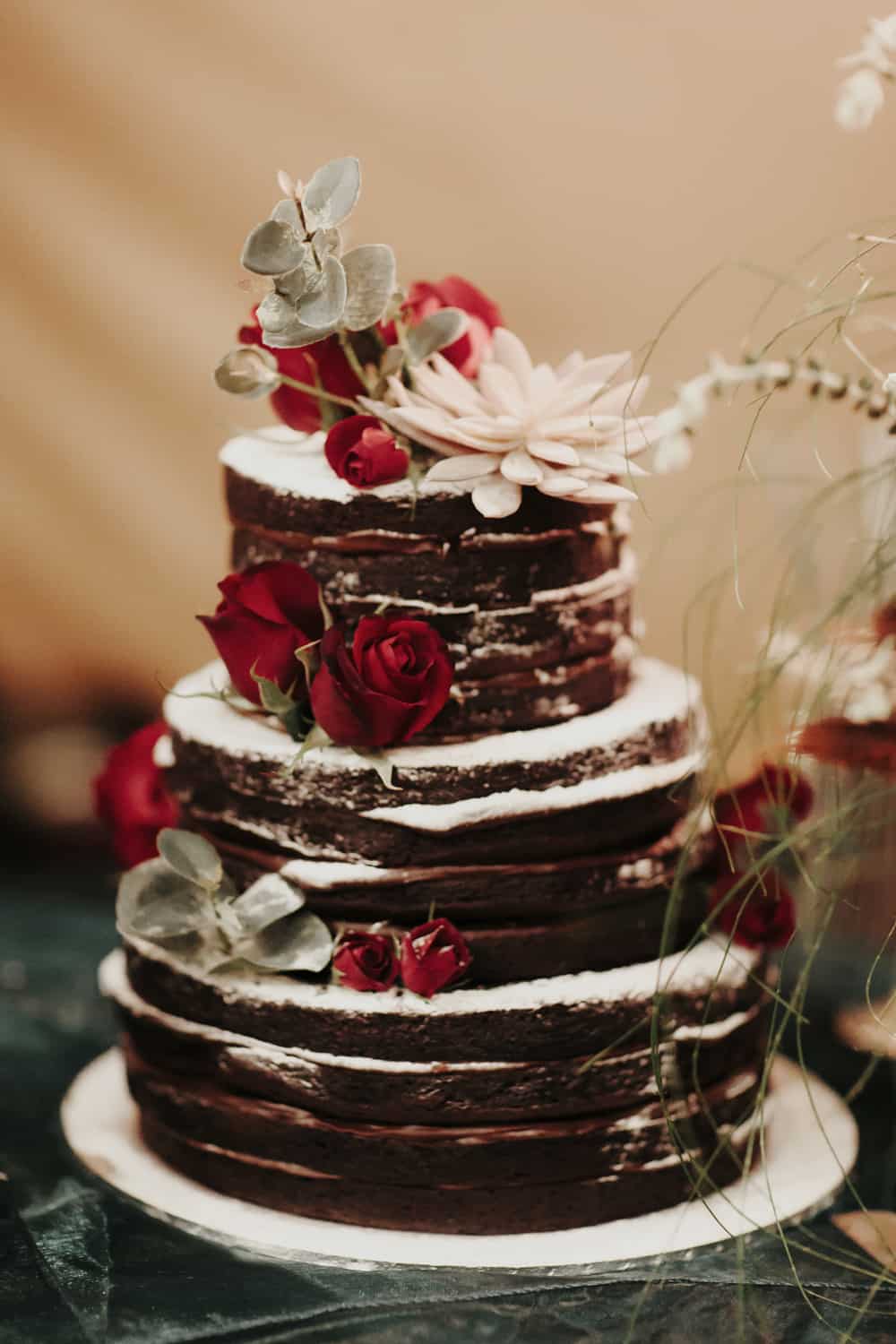 Chocolate Naked Layer Cake Dressed With Fresh Flowers Nouba Chocolate Naked Layer Cake
