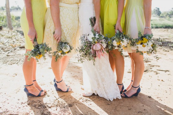 Bridesmaids in yellow | Photography by Jason Vandermeer