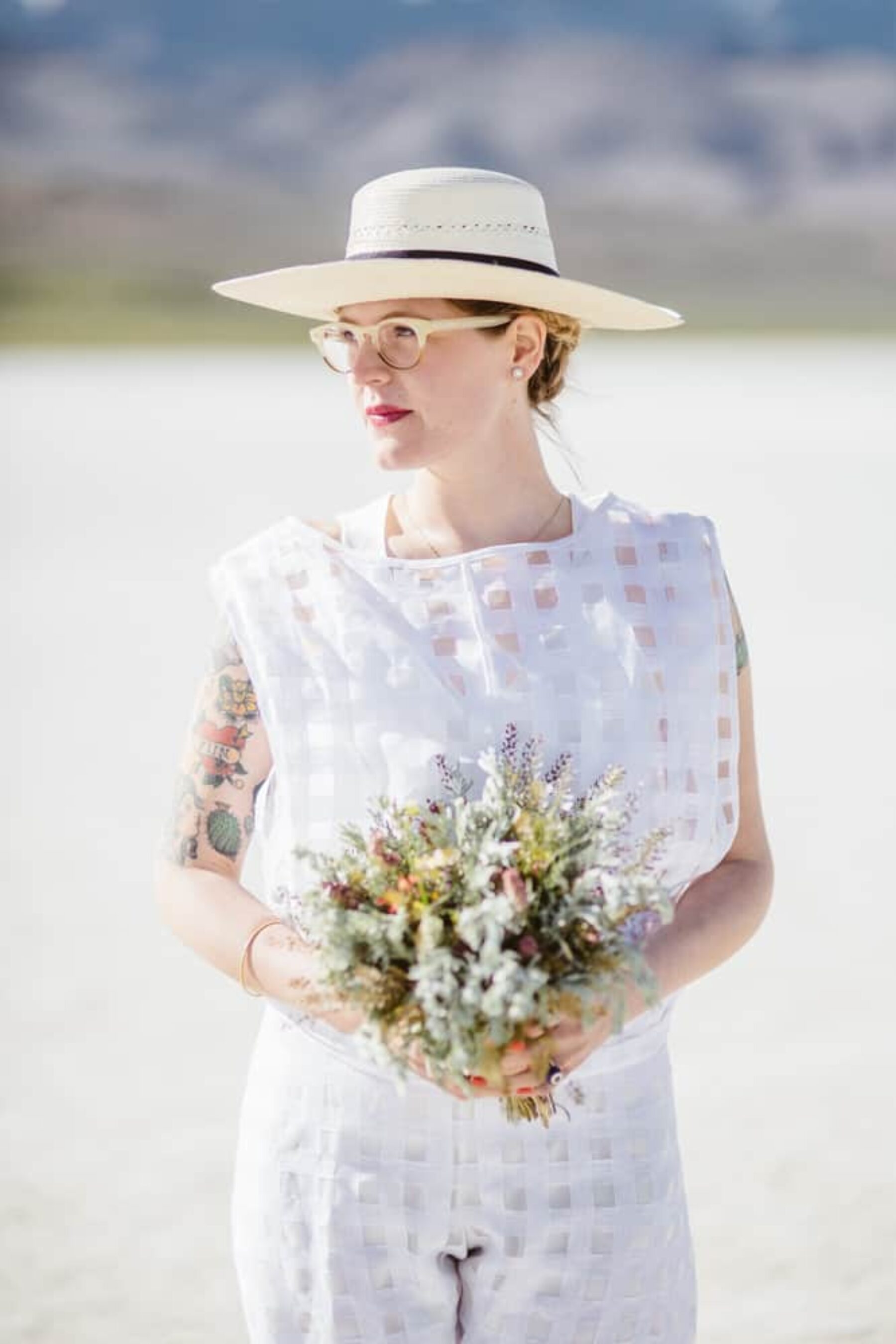 desert bride with wildflower bouquet