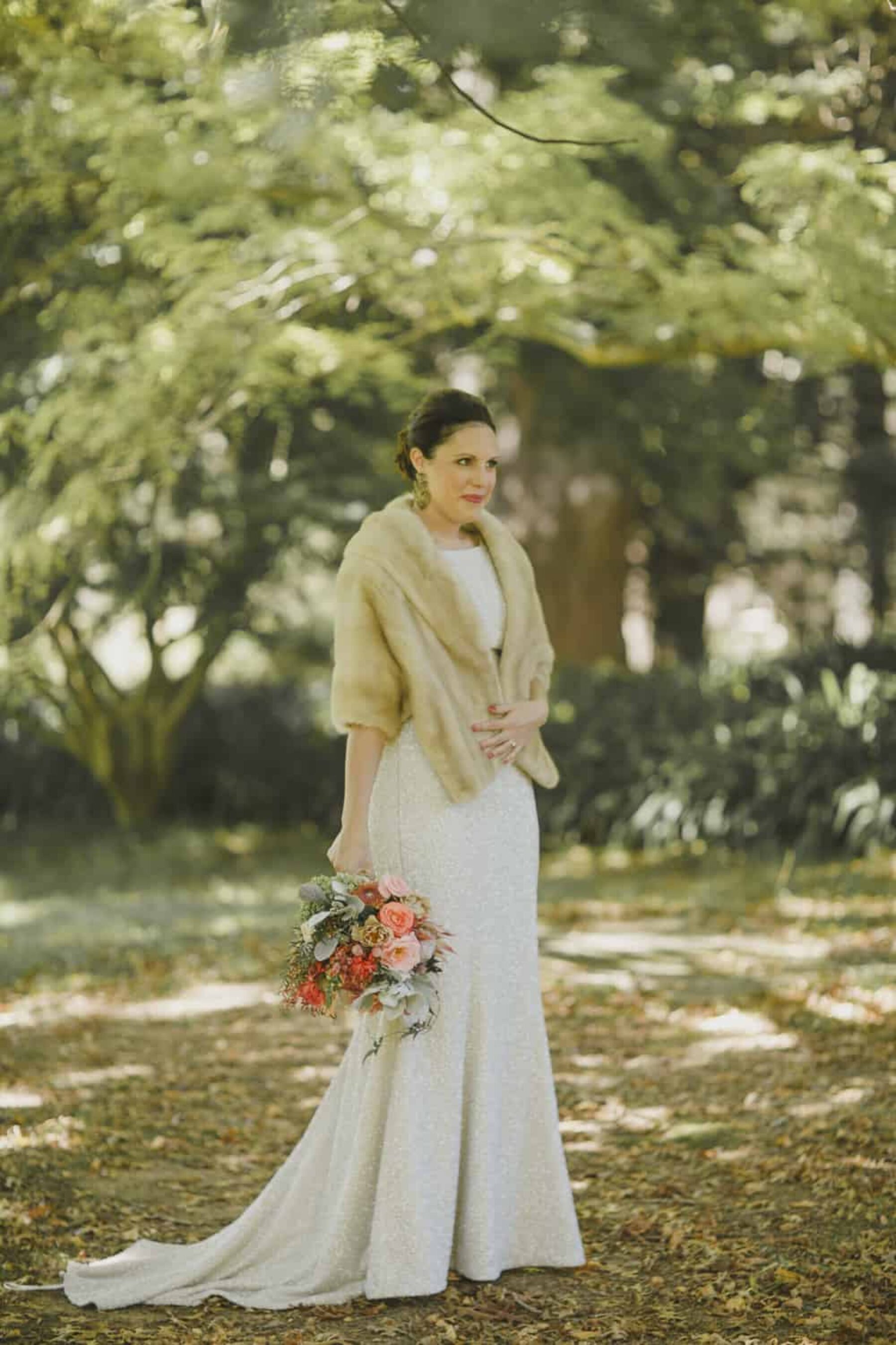 Suzanne Harward wedding dress with fur shrug / Nina Claire Photography