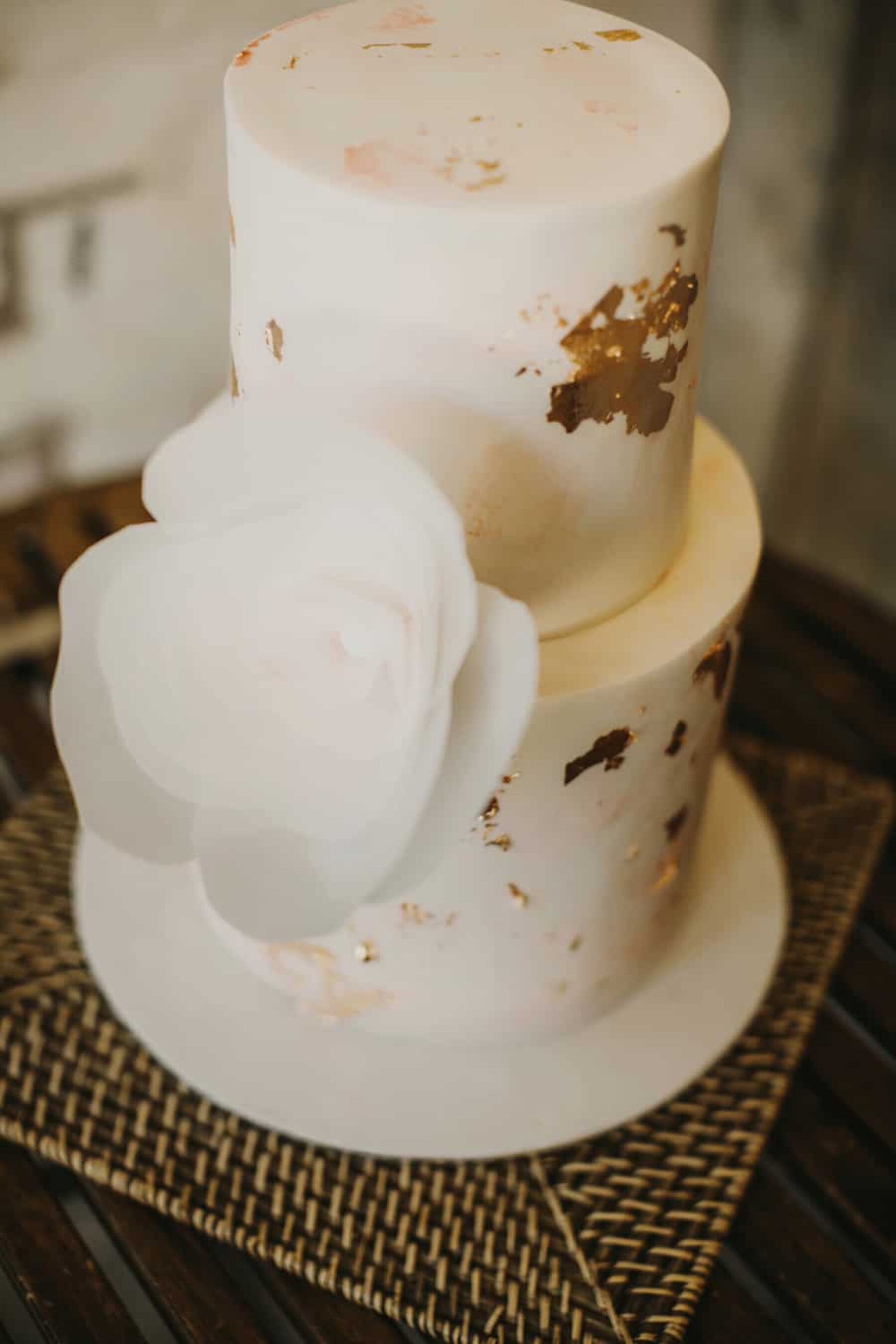 modern wedding cake with gold leaf