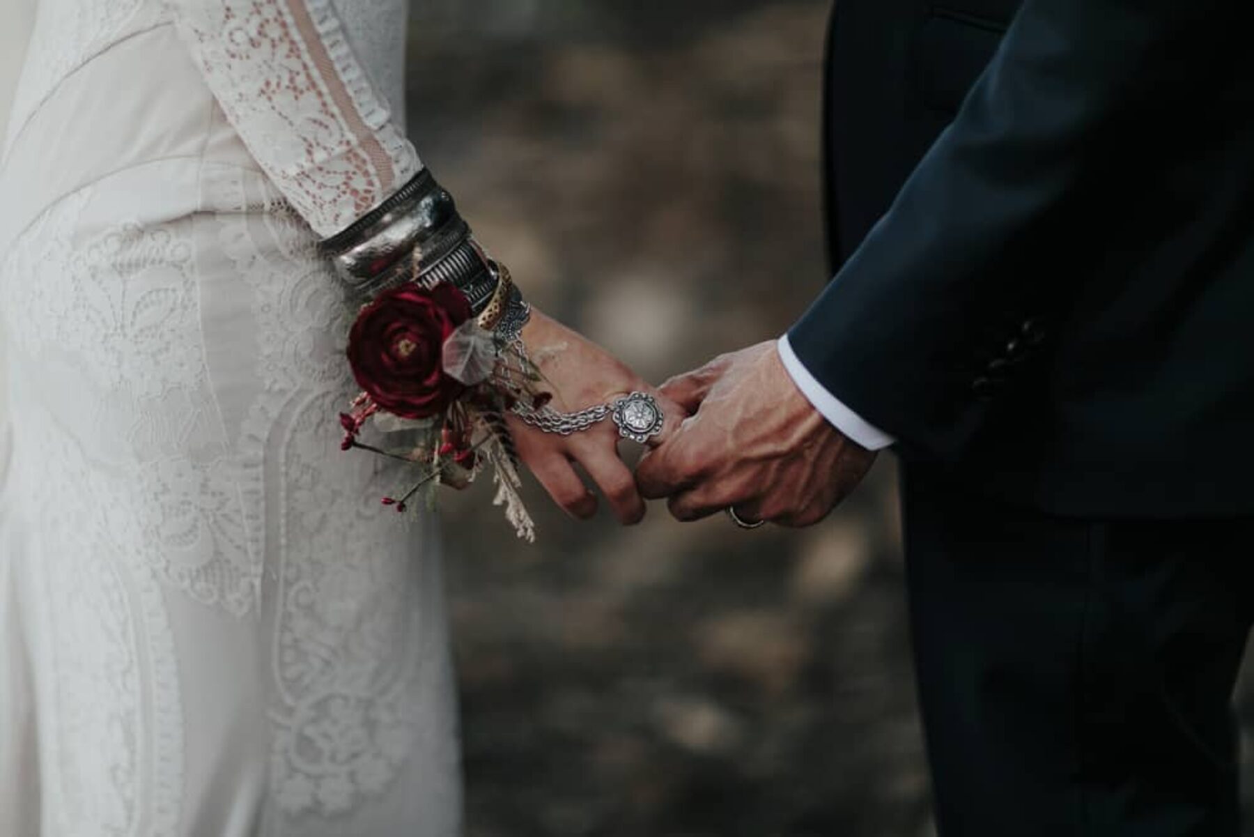 boho bride with silver cuff and ring chain