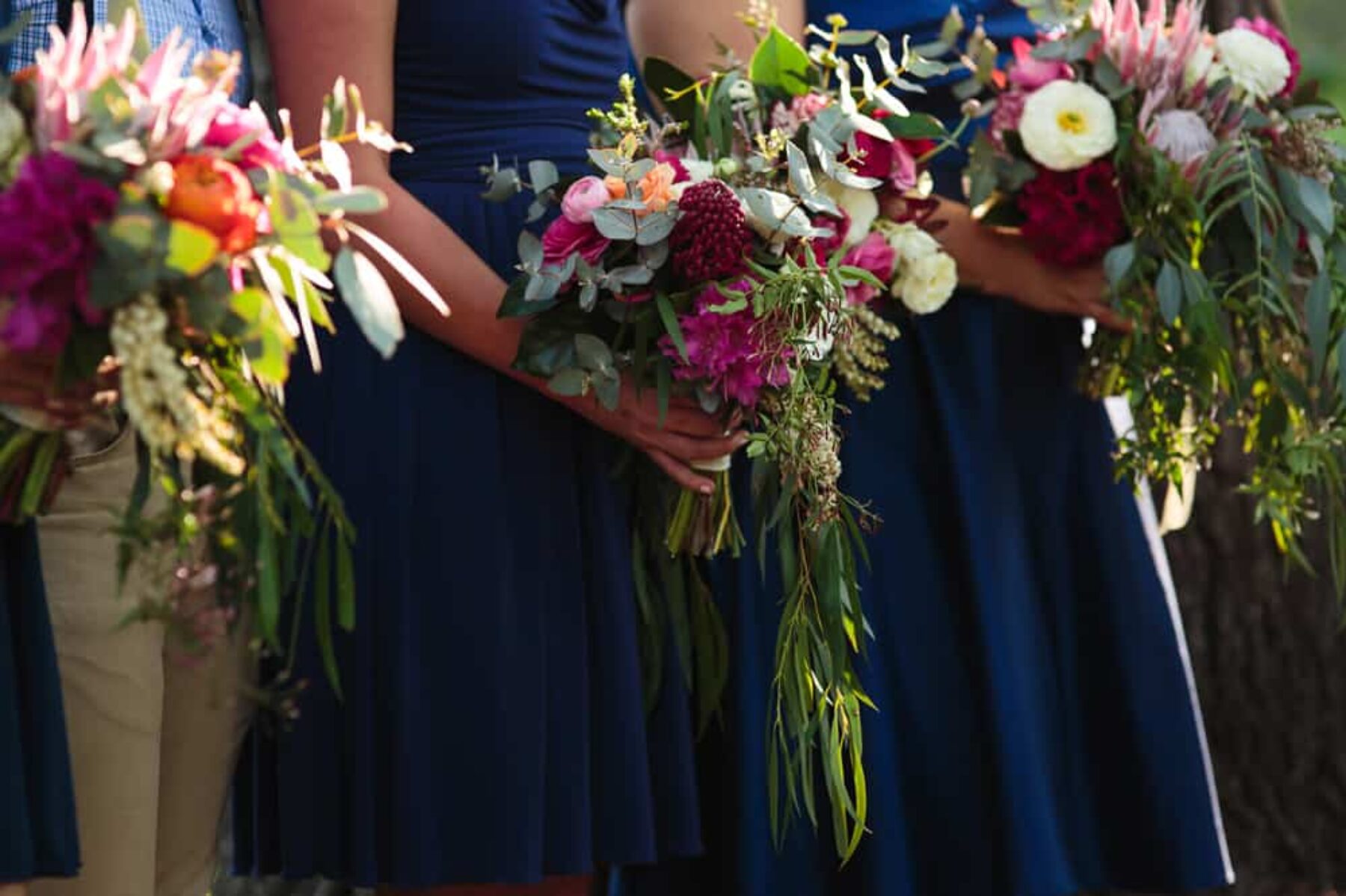 bridesmaids bouuets with native flowers