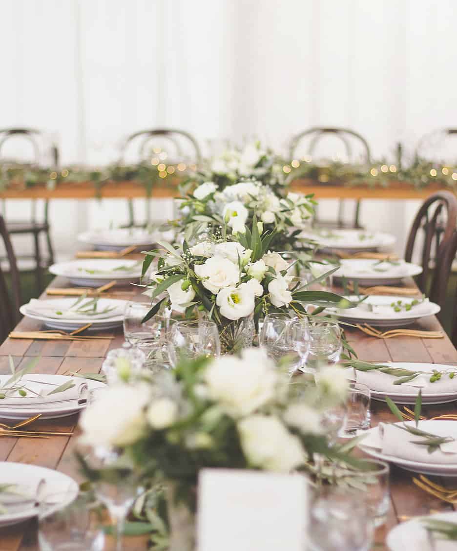 rustic wedding table with white flowers