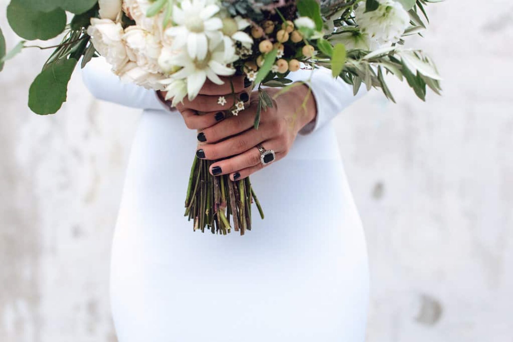 bride with black nail polish