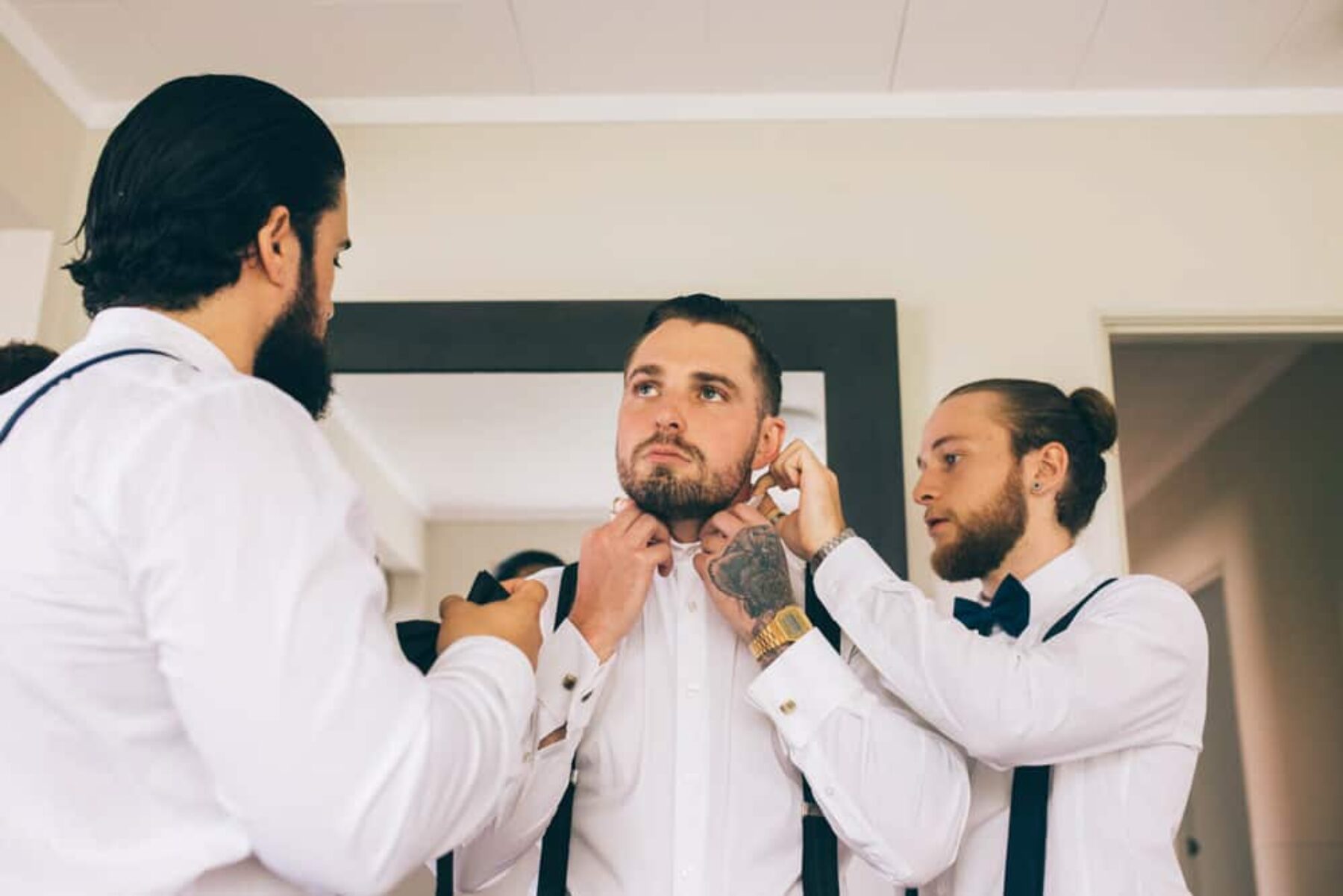 hipster groom getting ready