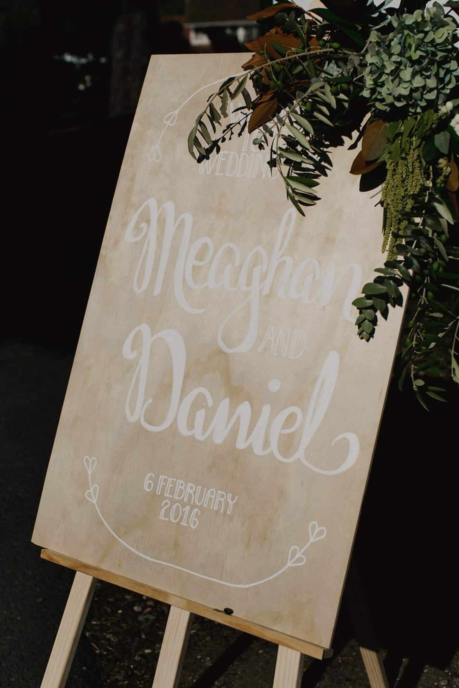 hand painted timber wedding sign