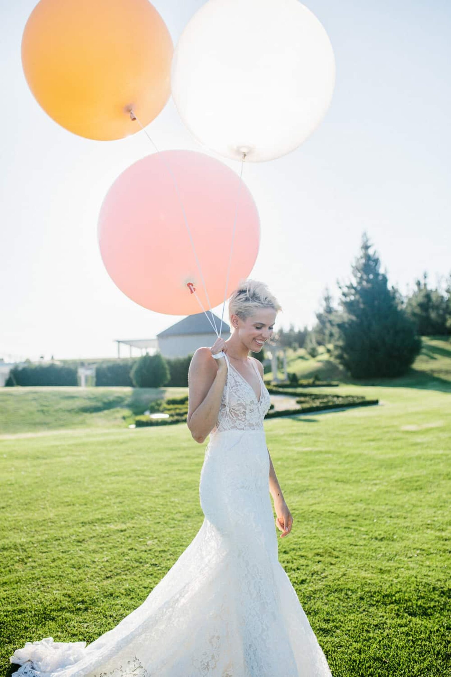 bride with giant pastel balloons