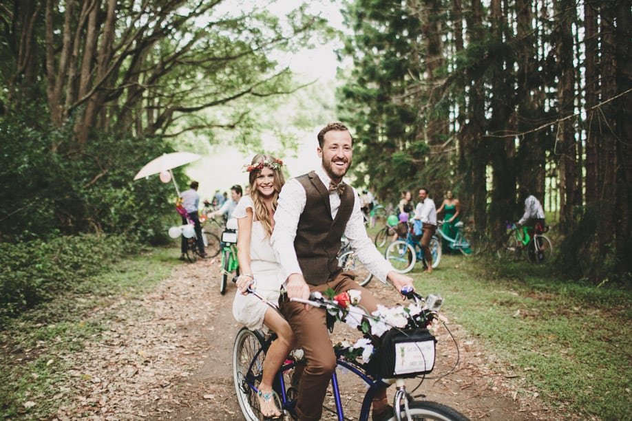 boho bride and groom on bike