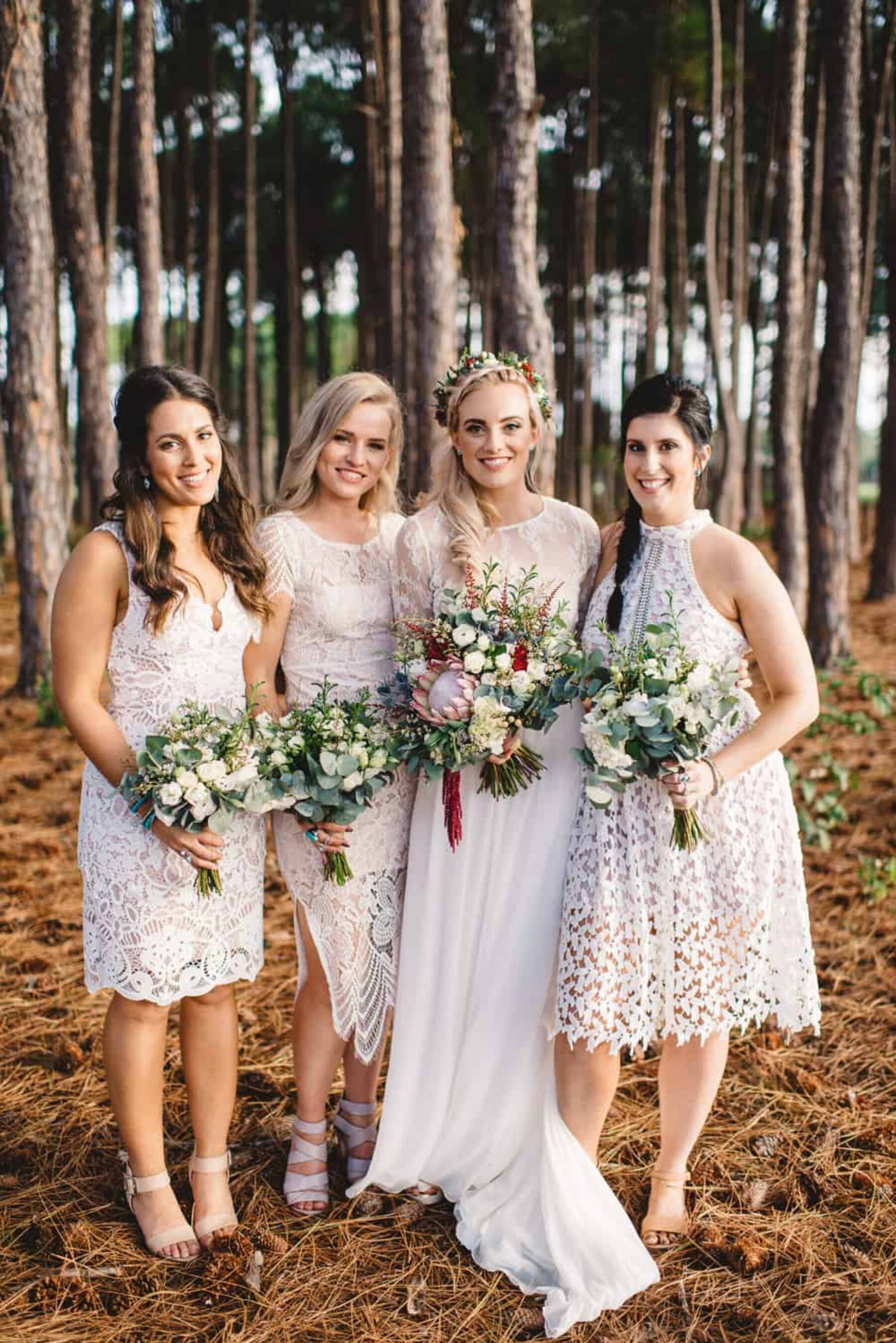 bridesmaids in mixed white dresses