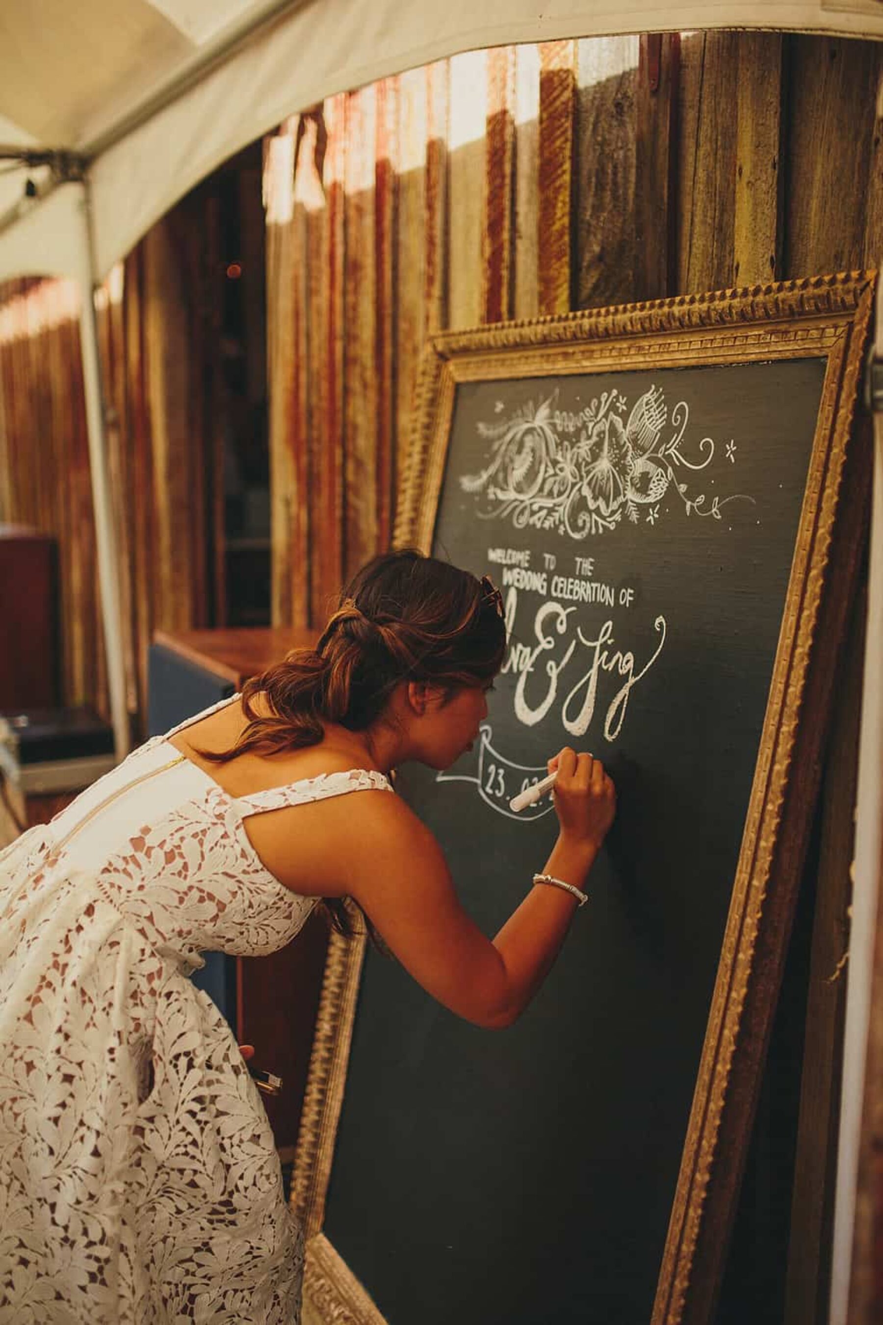 hand-lettered wedding chalk board