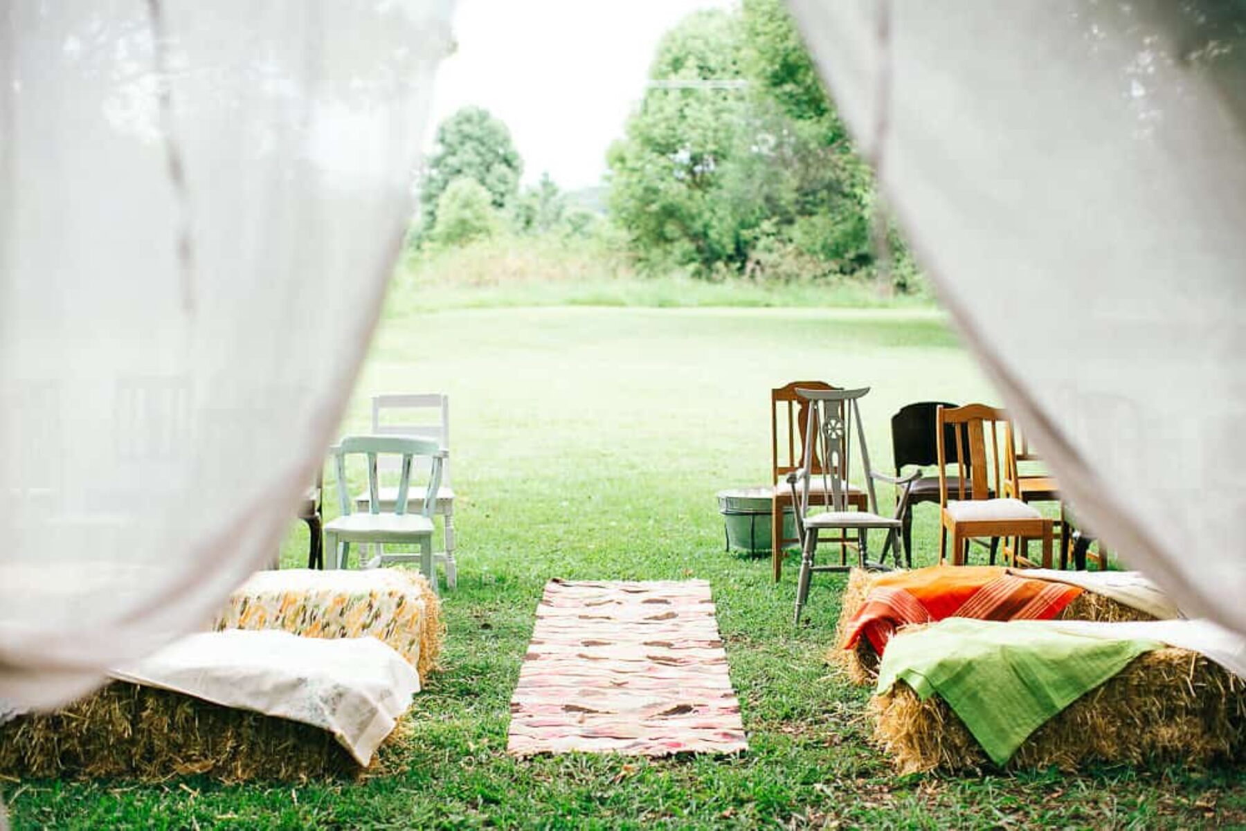 ceremony setup with mismatched vintage chair