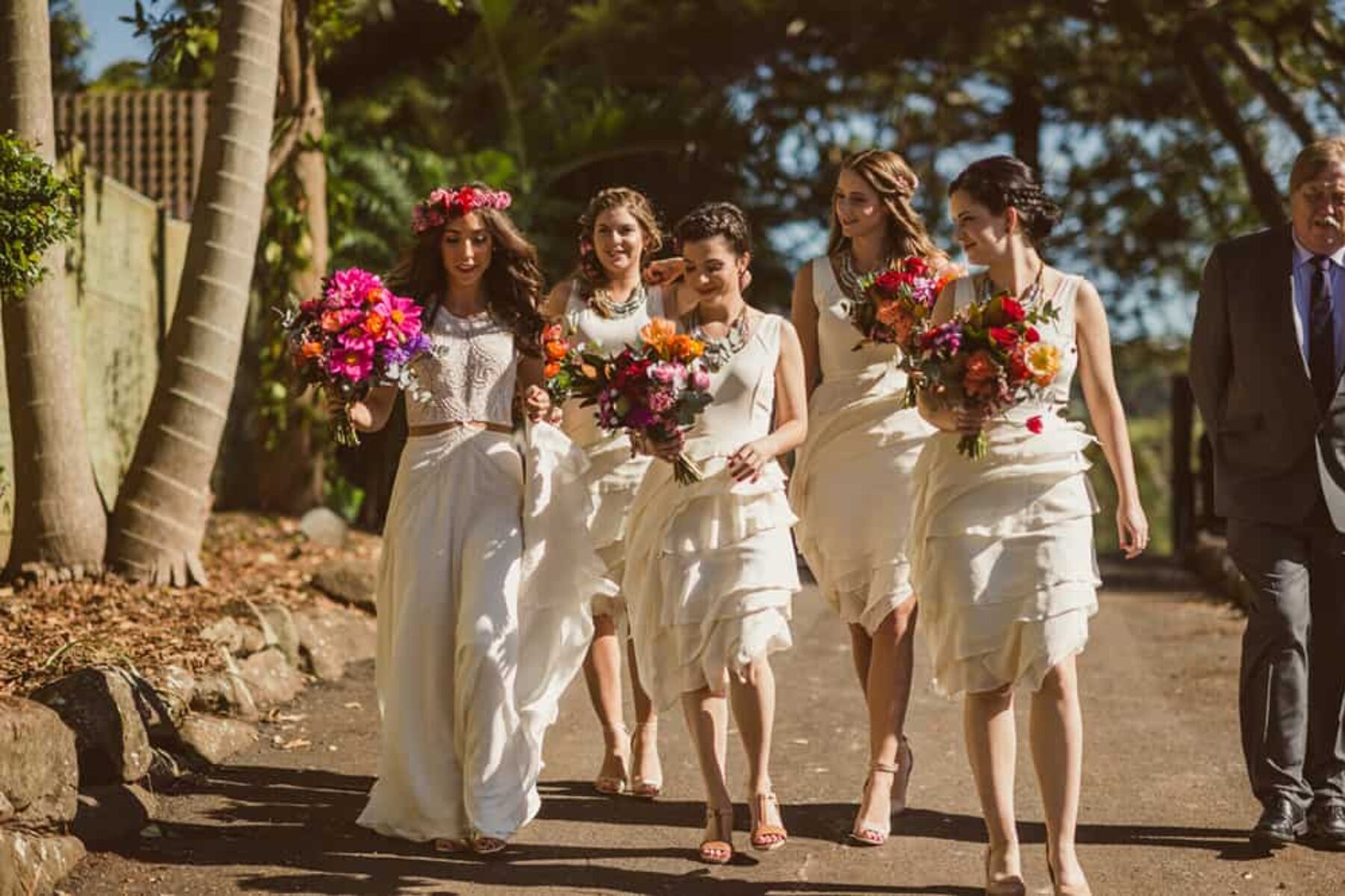 bride and bridesmaids with vibrant bouquets