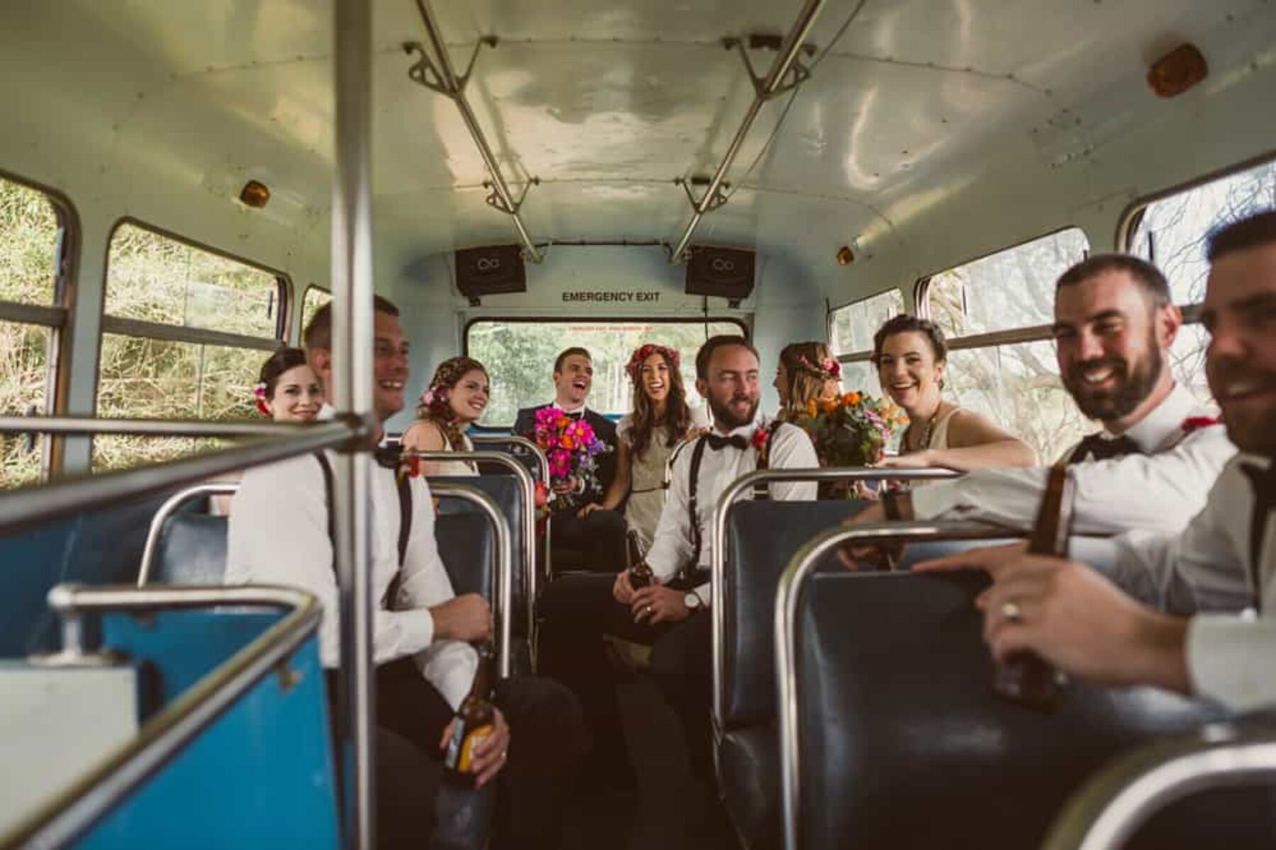 bridal party on wedding bus