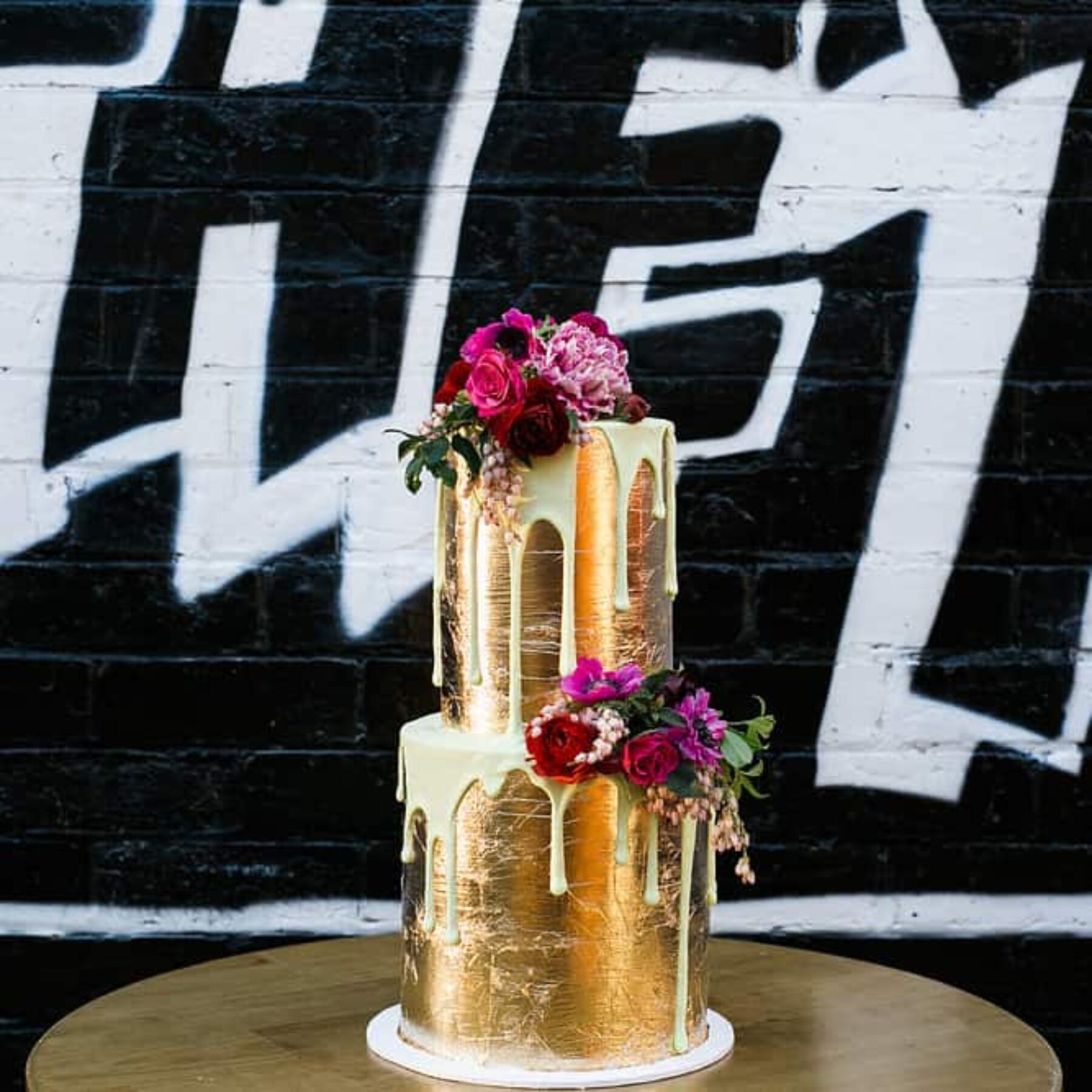 gold leaf drip wedding cake