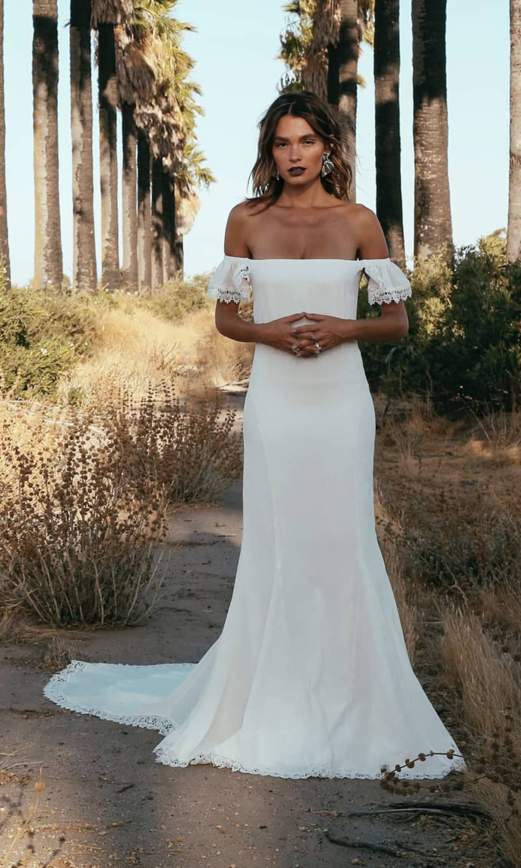off-shoulder wedding dress by Daughters of Simone