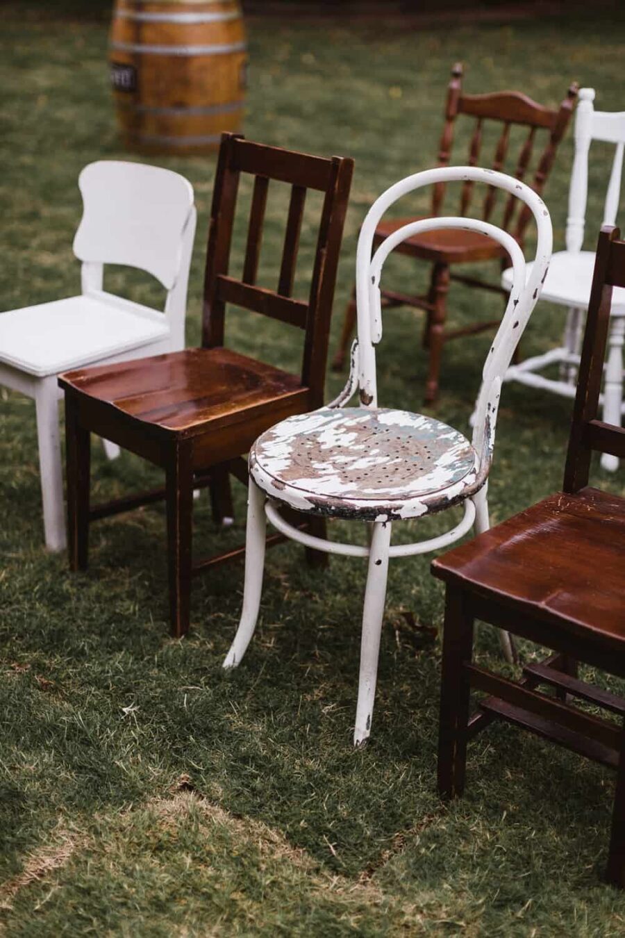 vintage mismatched wooden chairs