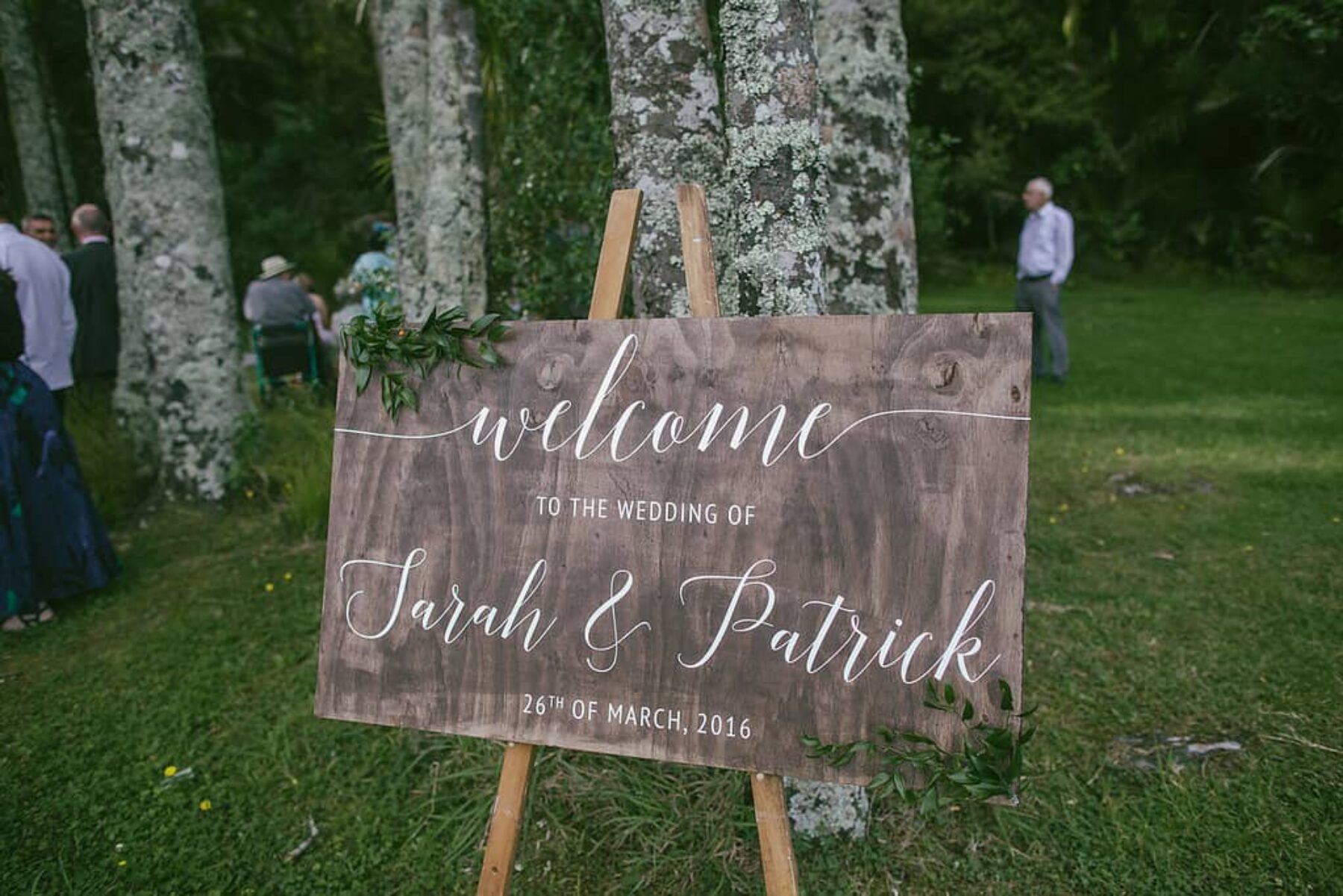timber hand-painted wedding welcome sign