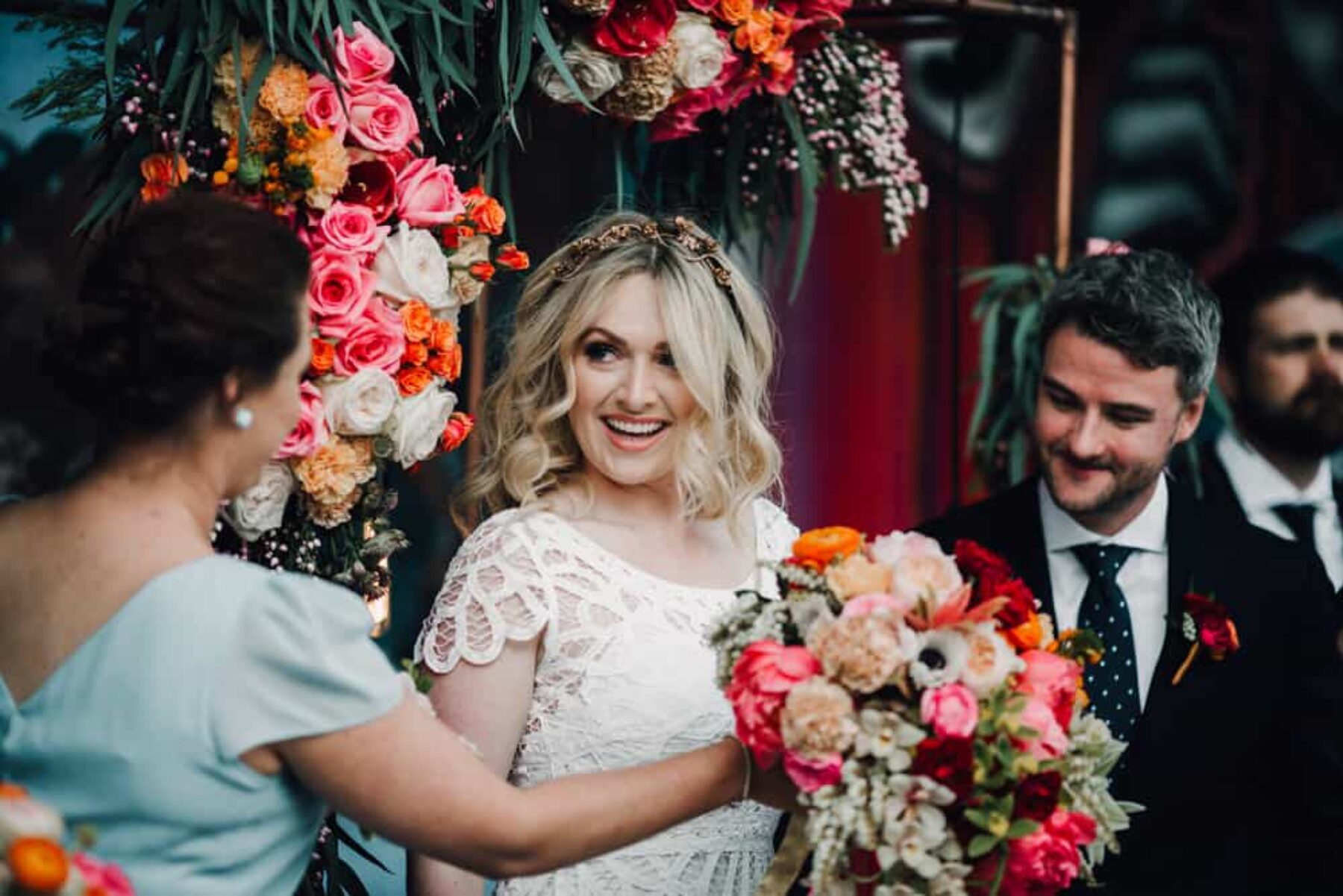 Rue de Seine bride with peach and pink peony bouquet