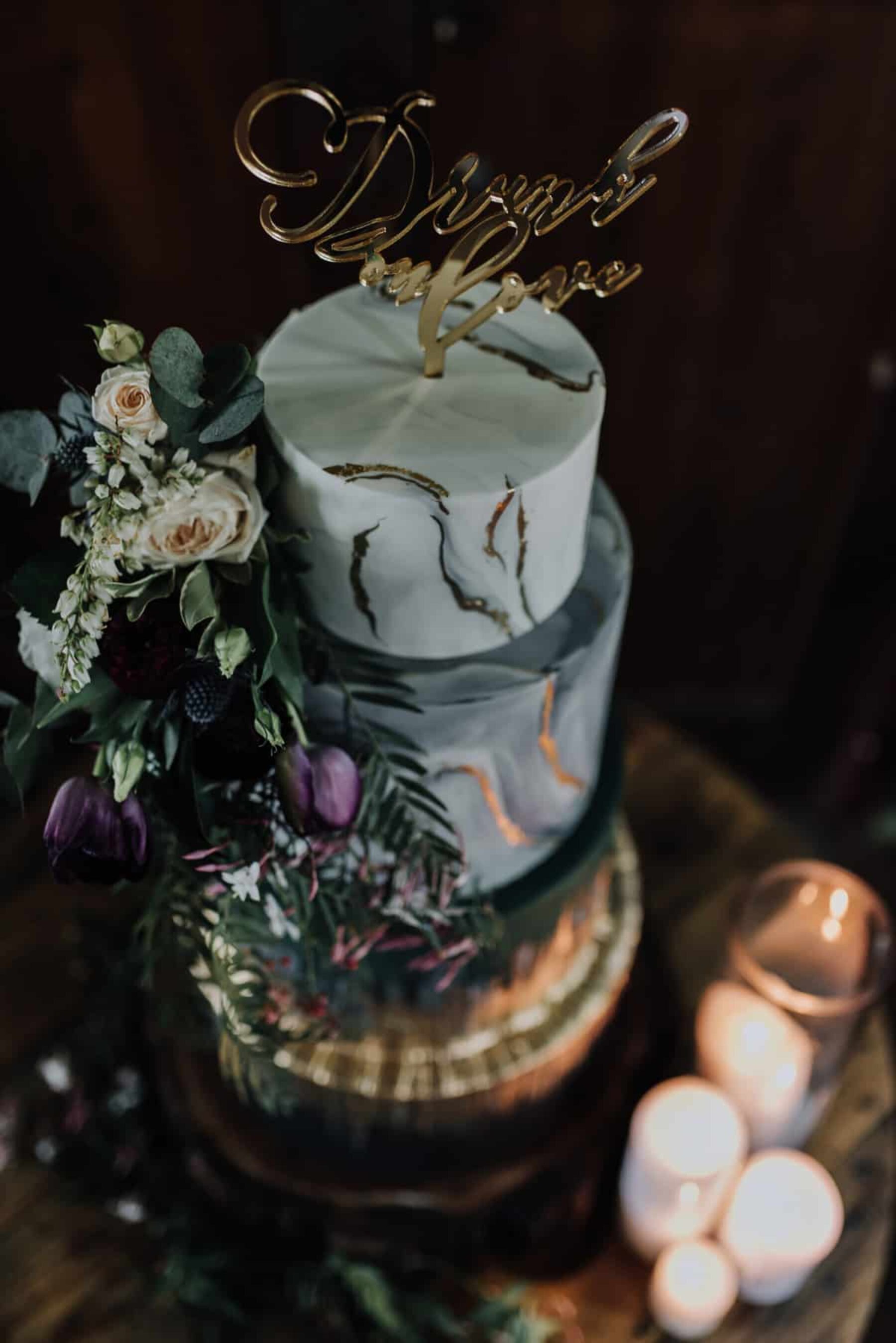 marble and gold leaf wedding cake