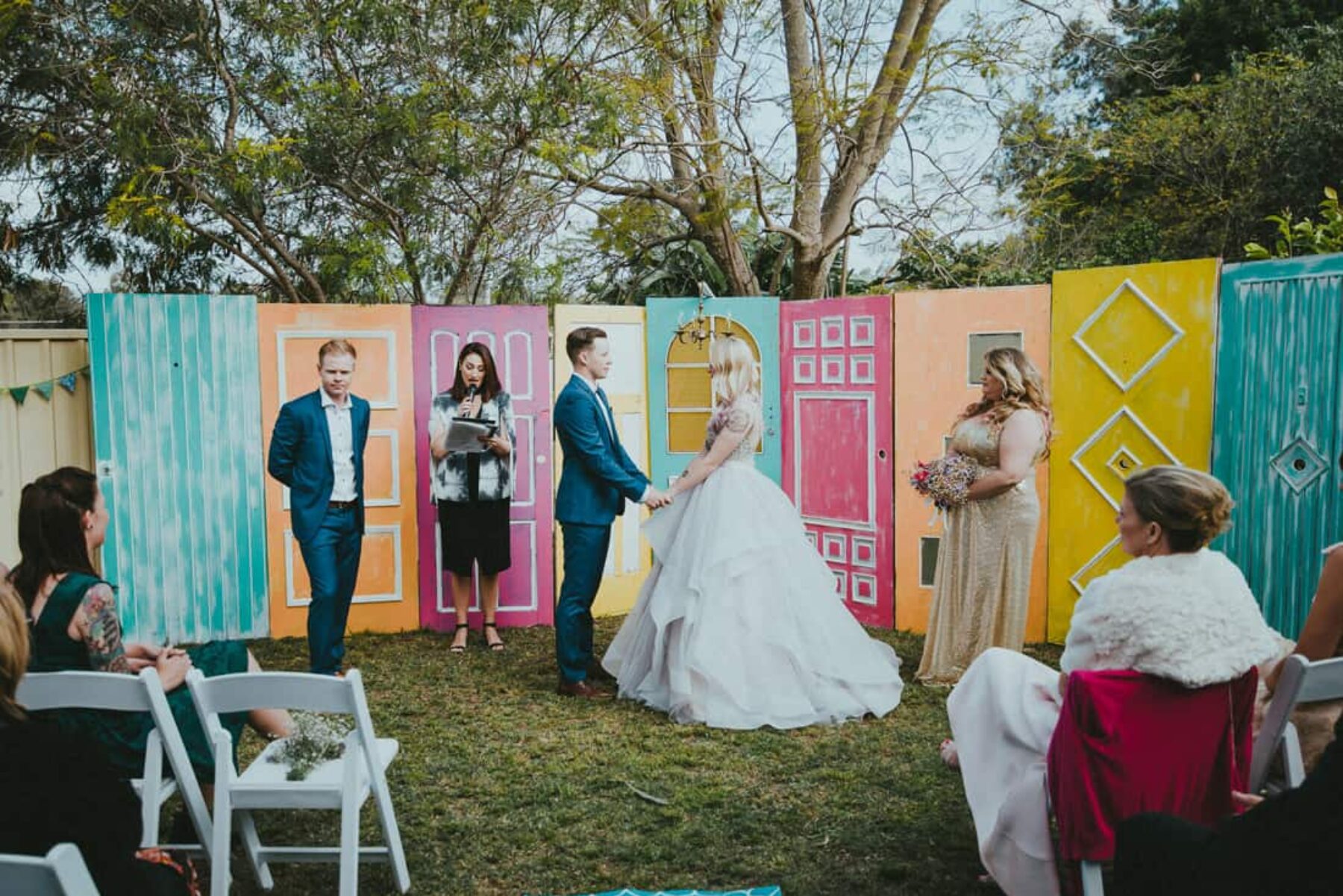 colourful painted door wedding backdrop