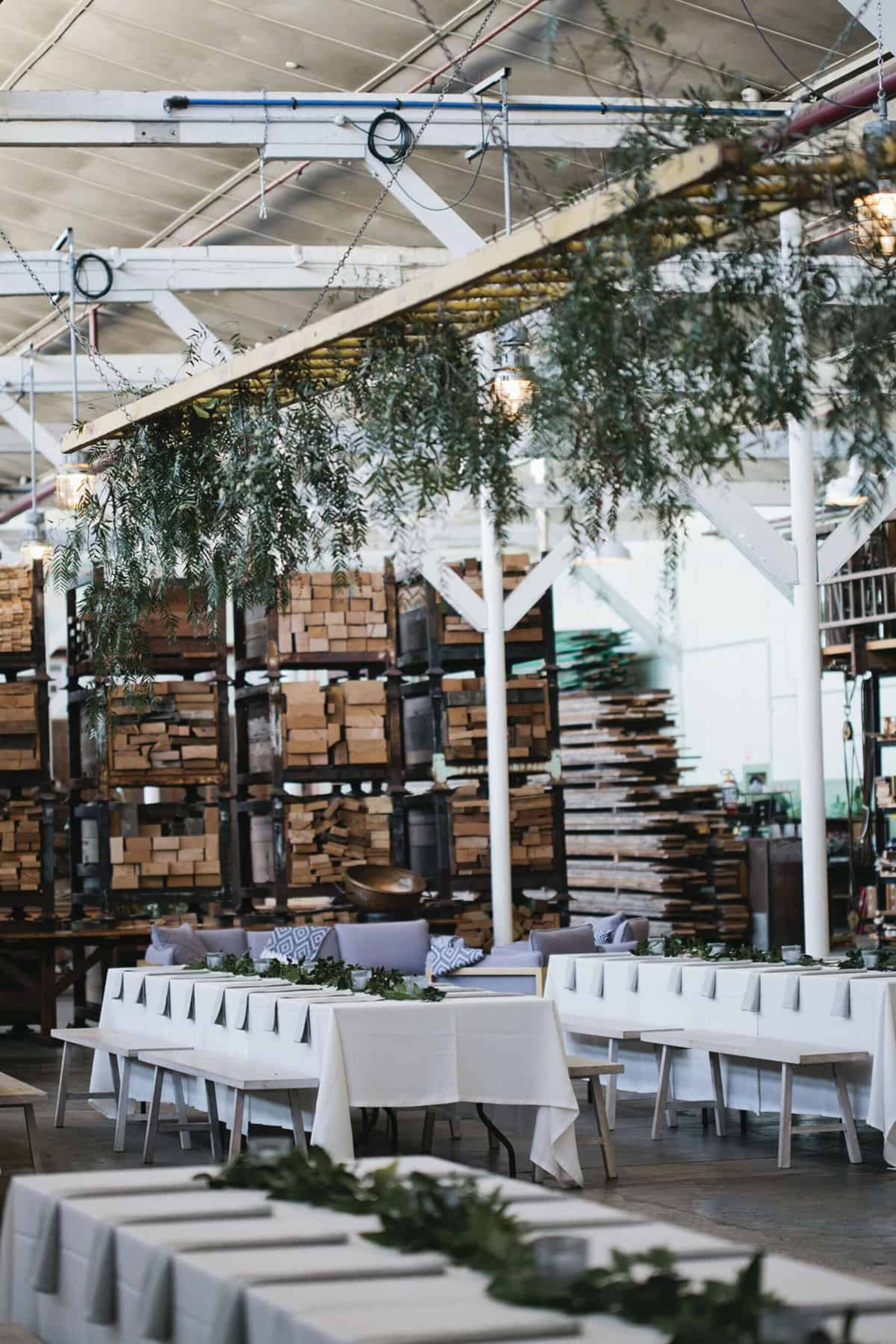 Industrial wedding with hanging greenery