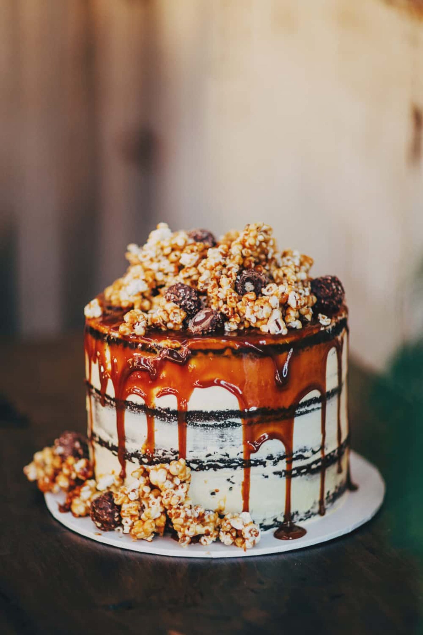layered chocolate mud cake with salted caramel and popcorn