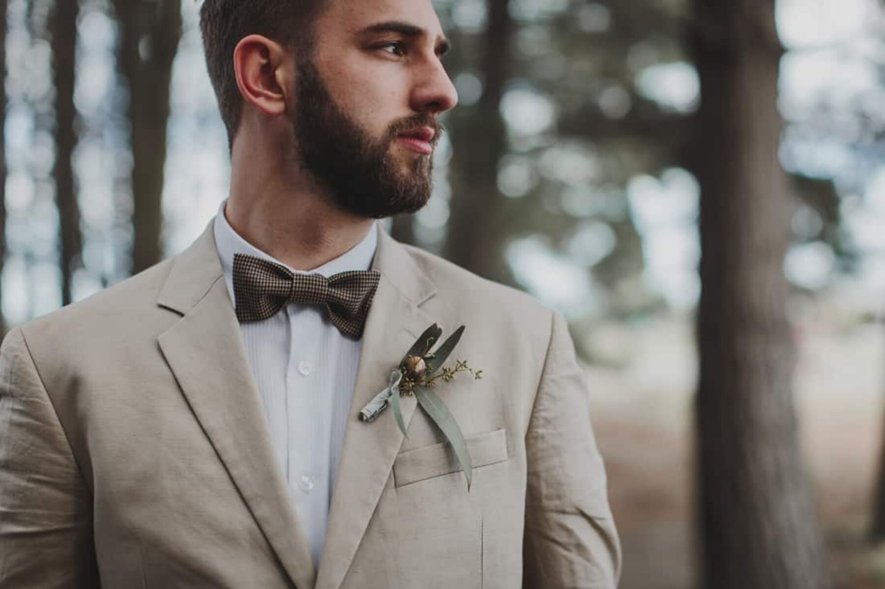 vintage groom with eucalyptus boutonniere