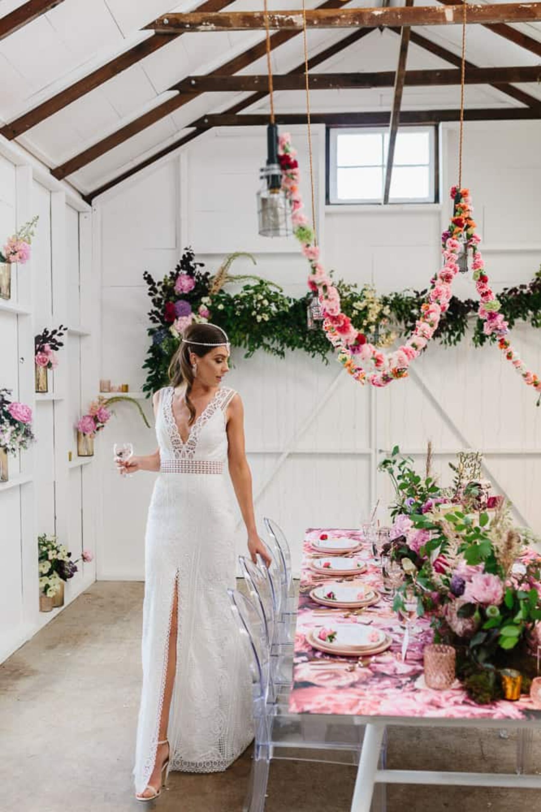 Floral tablescape with hanging floral garlands