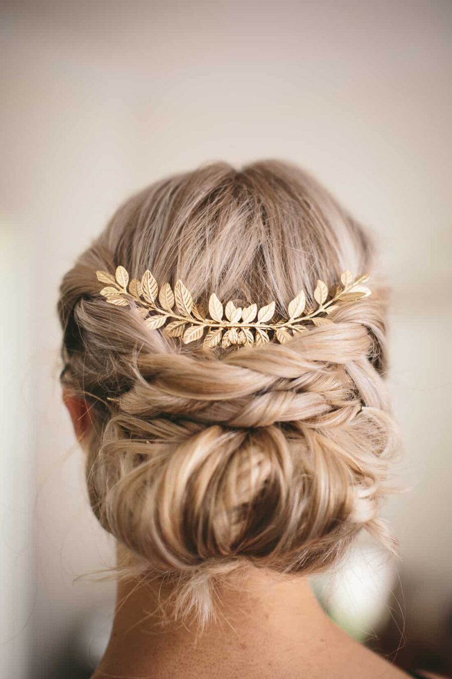 bridal braid with gold hairpiecce