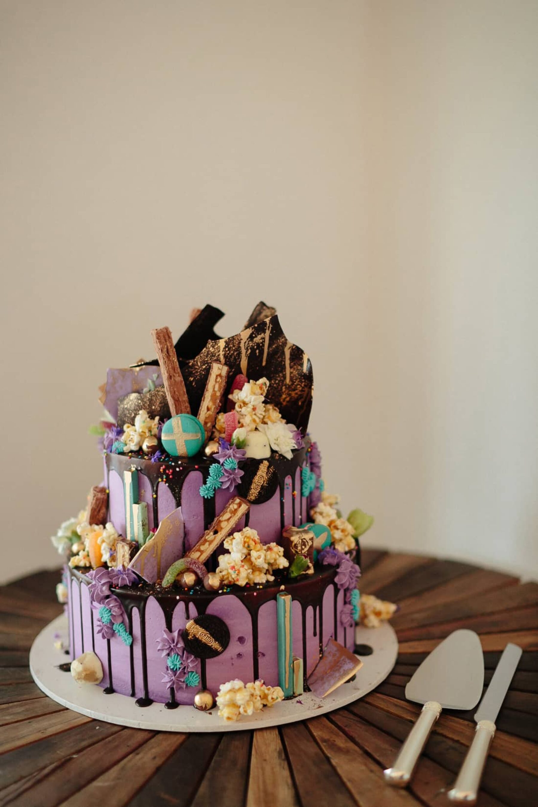 creative purple drip wedding cake by Unbirthday Cake
