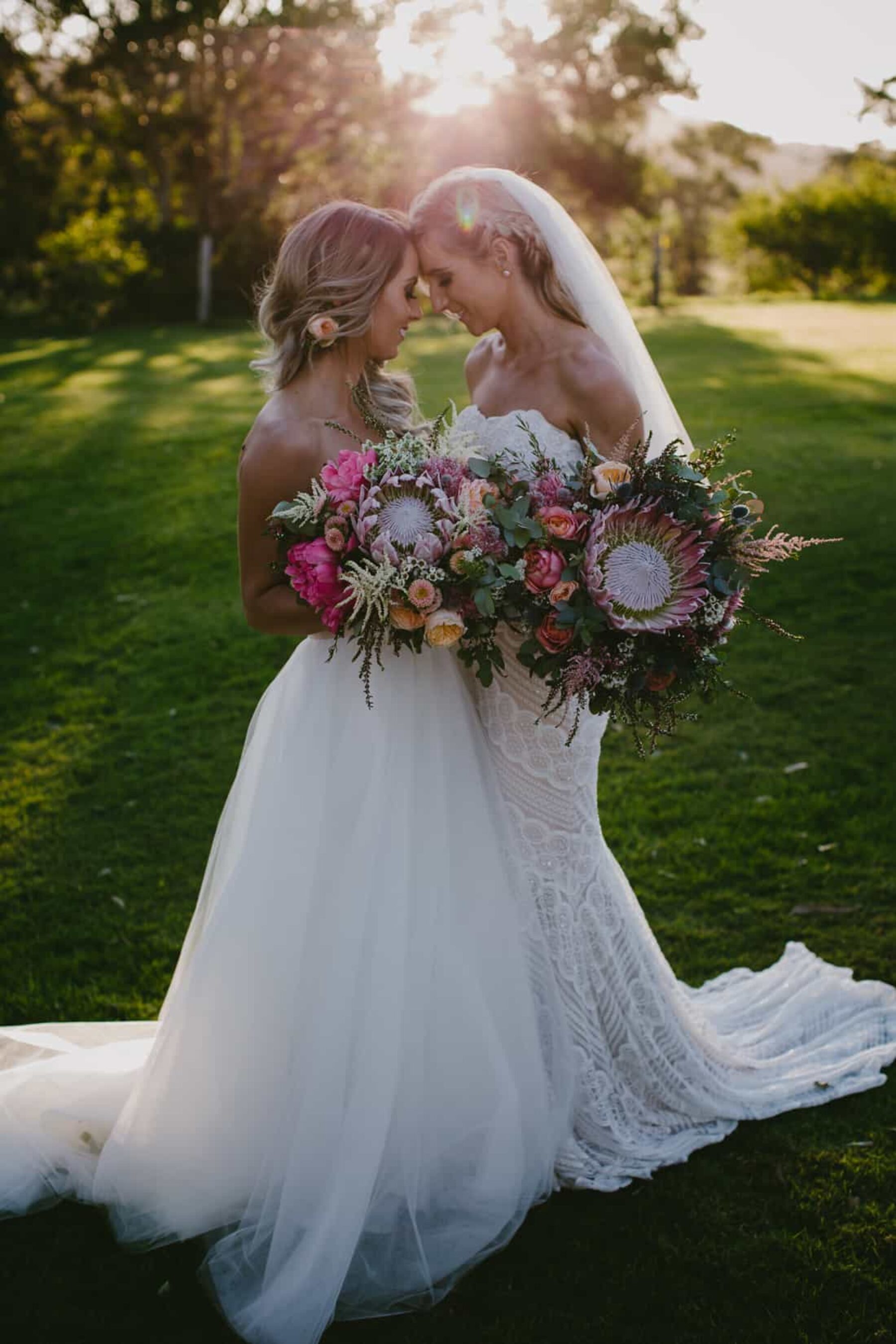 gorgeous brides with protea bouquets