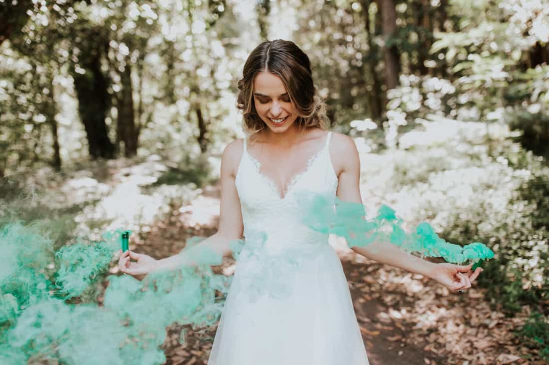 bride with green smoke bomb
