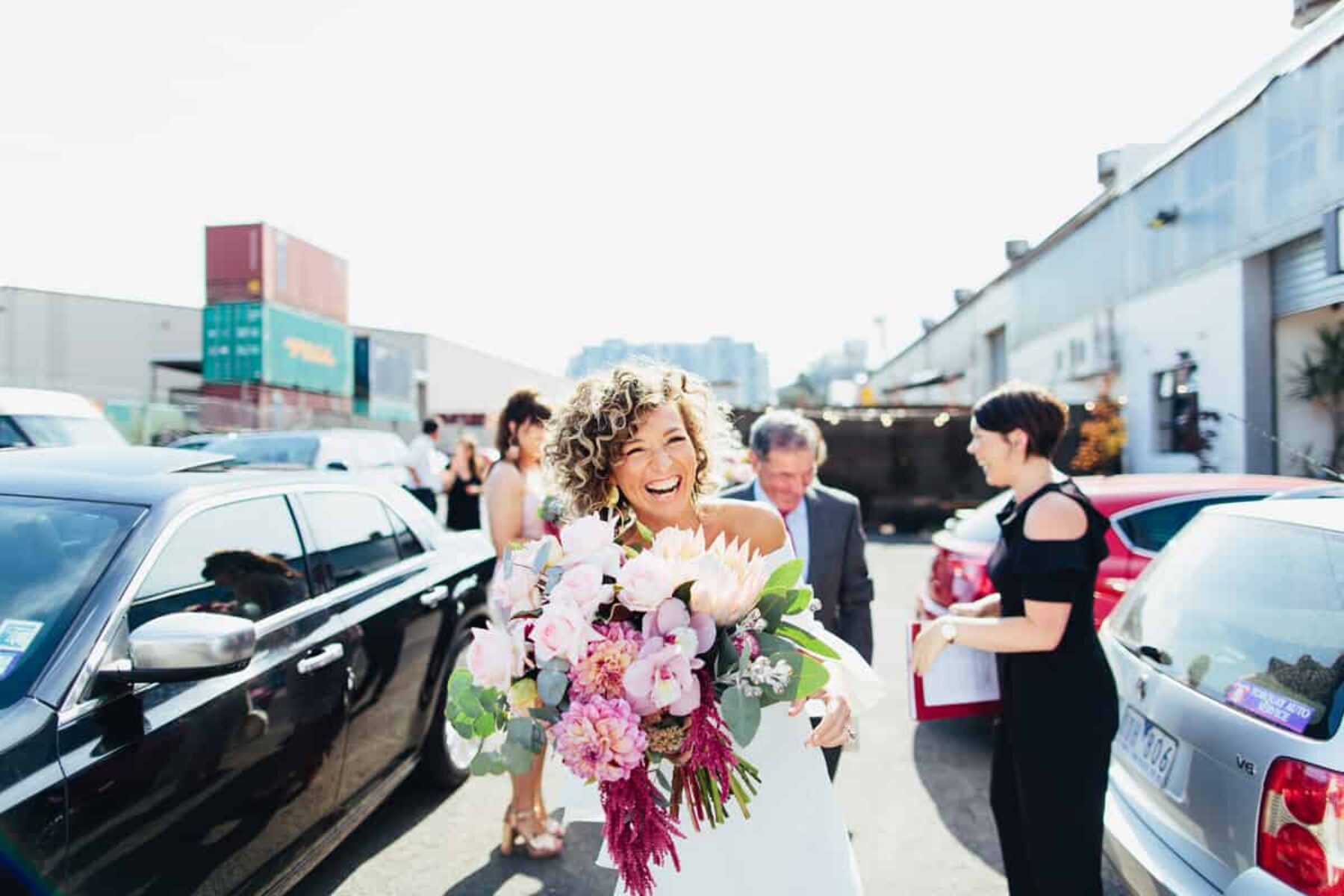 oversize pink bouquet with roses, hydrangea, dahlias, protea and amaranth