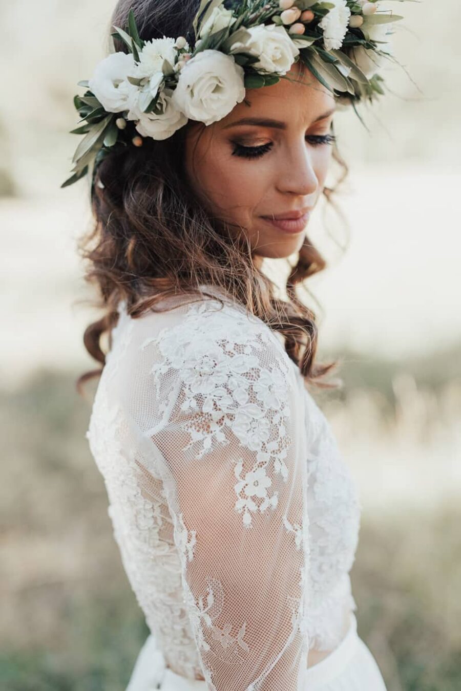 boho bride with green and white flower crown