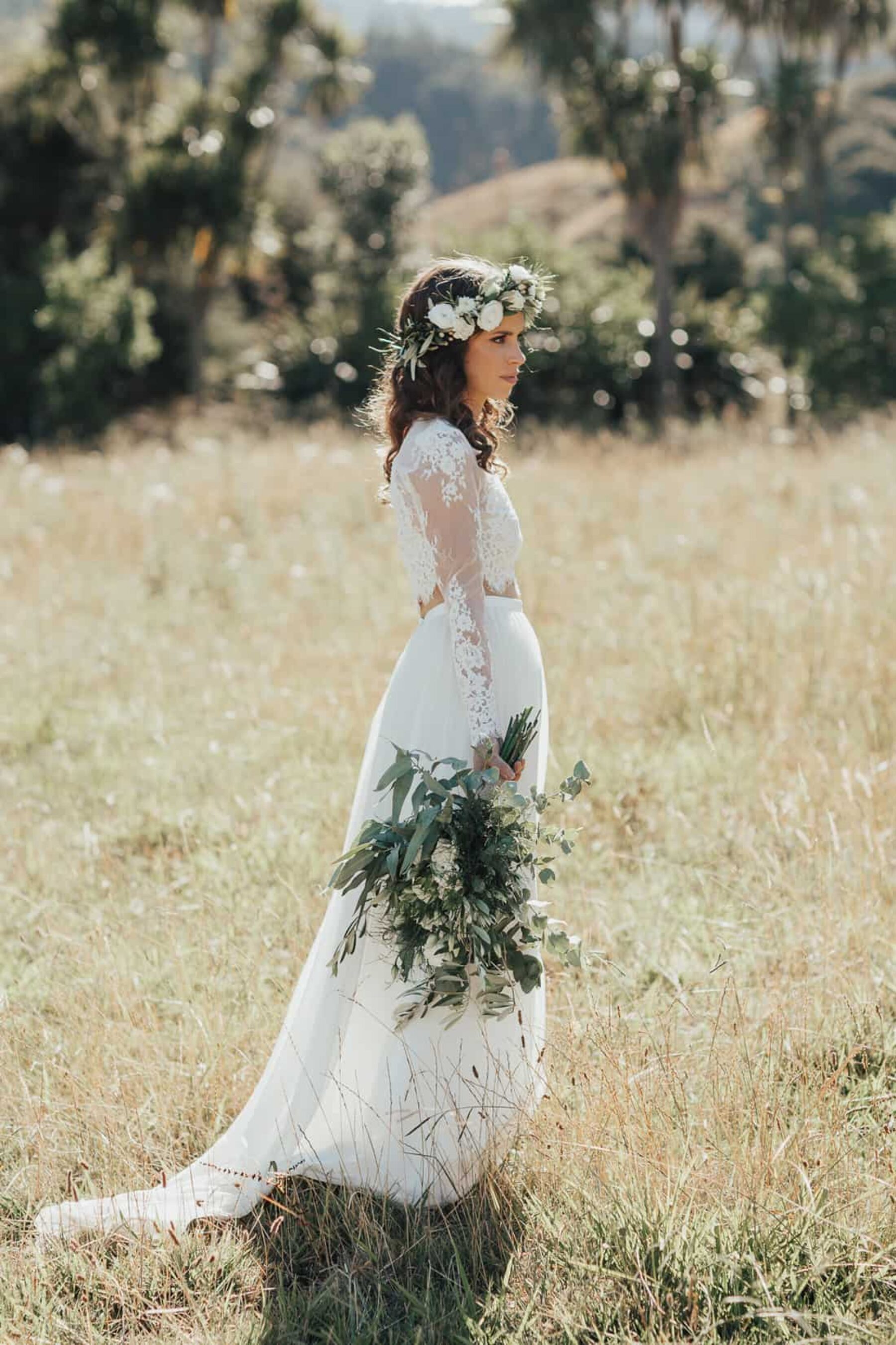 boho bride with green and white flower crown
