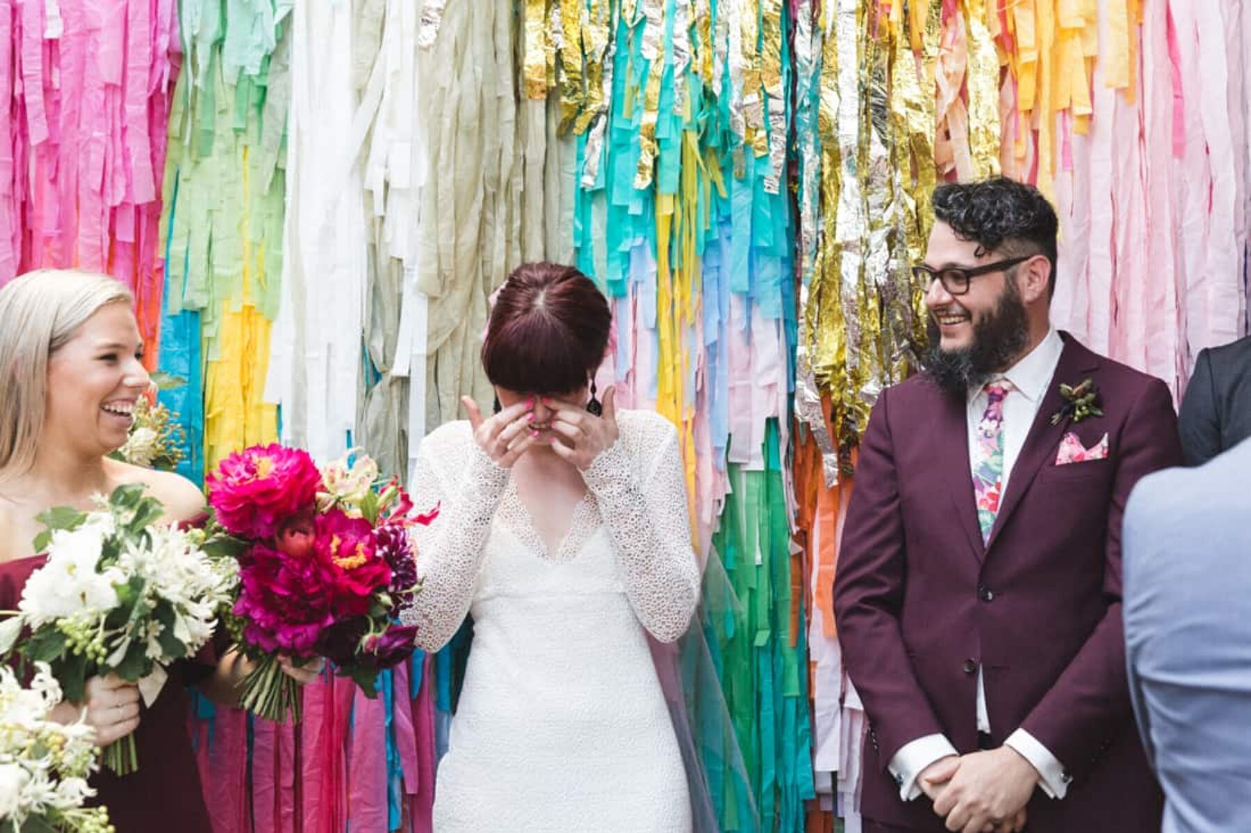 colourful streamer wedding backdrop