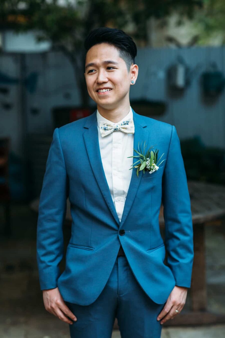 Fremantle weddgroom in cobalt blue suit with floral bow tie