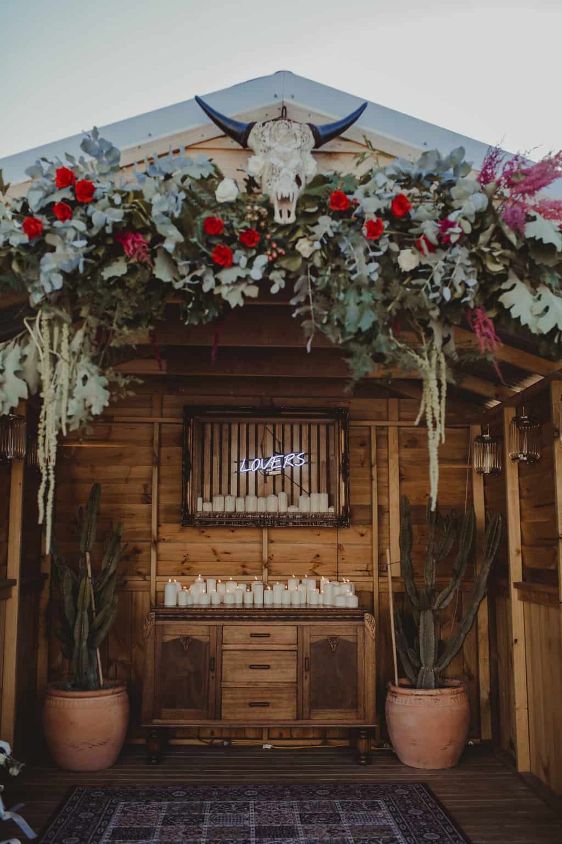 boho floral wedding arbour with bull skull