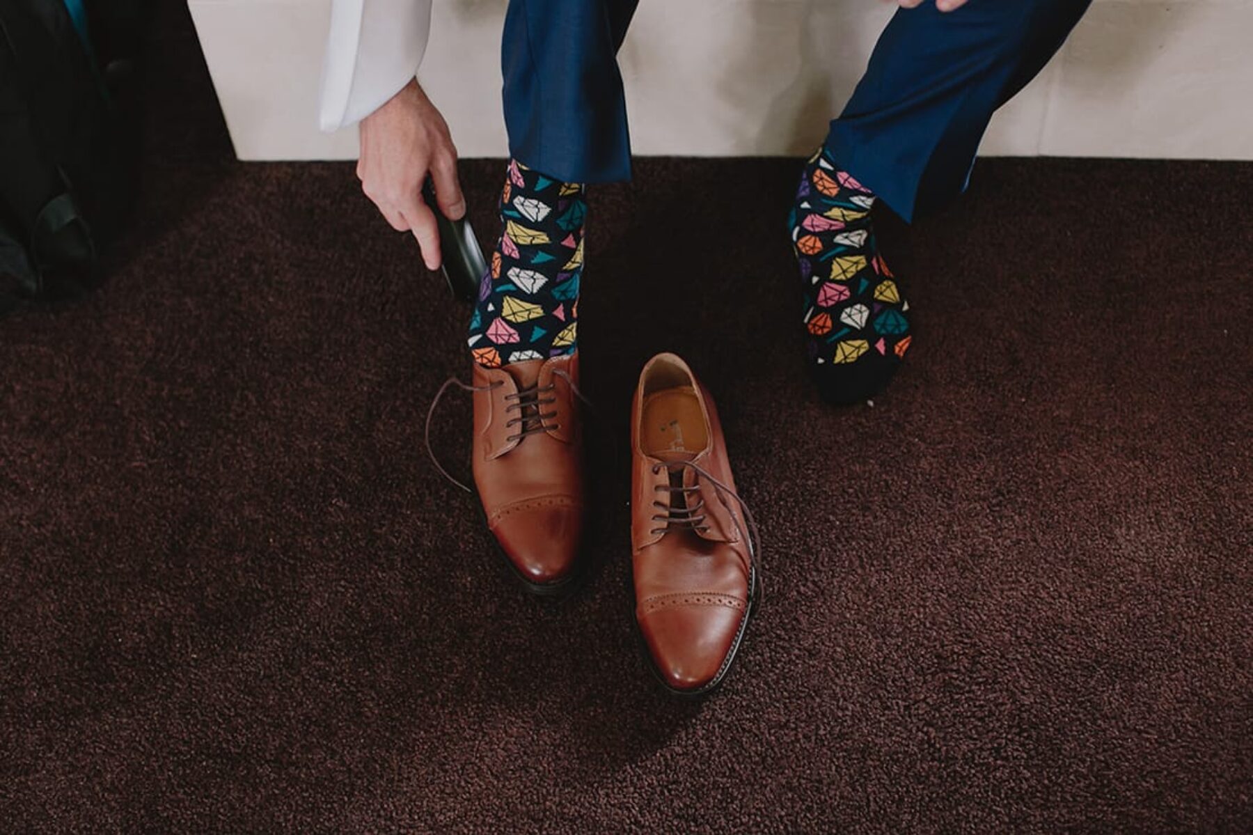 groom wearing Happy Socks