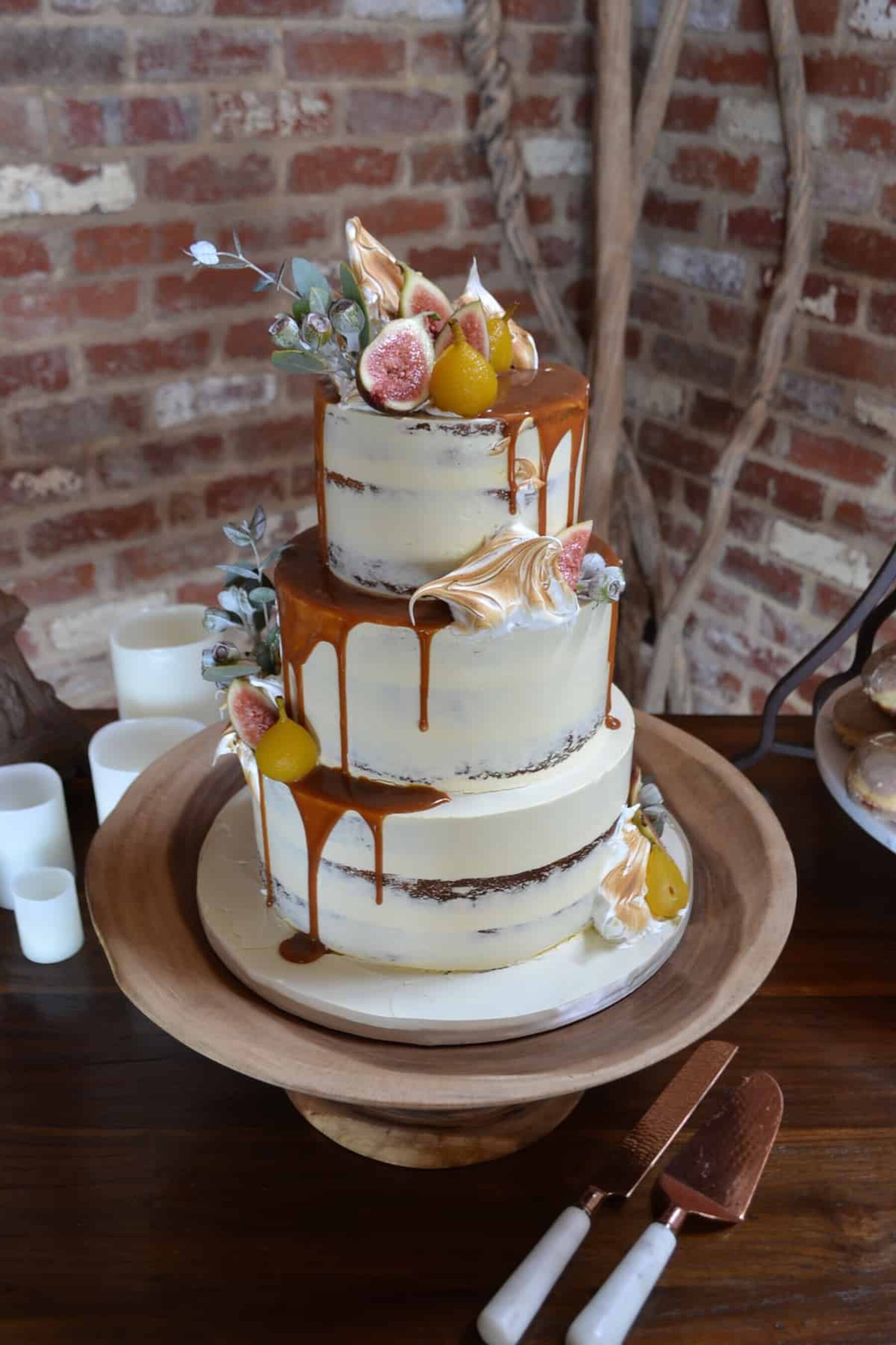 modern-rustic wedding cake with caramel drip