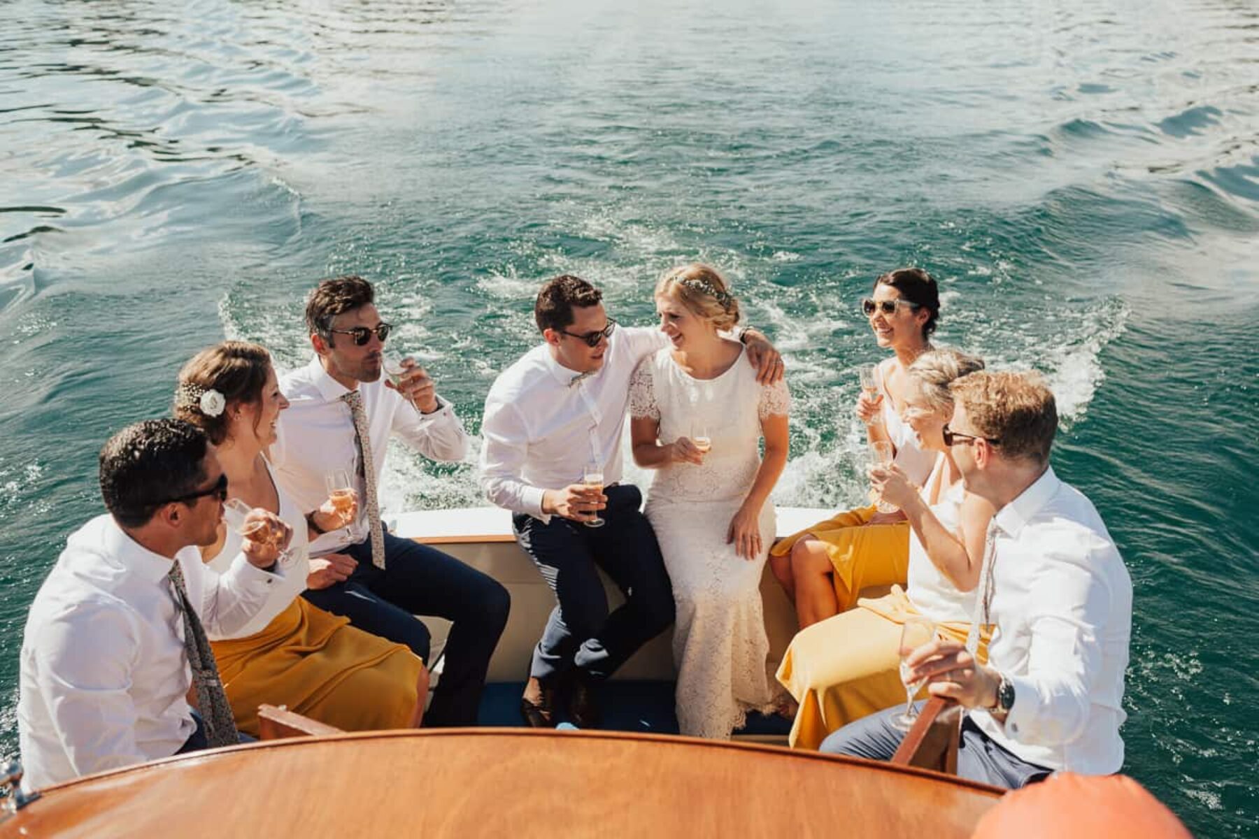 bridal party on vintage boat