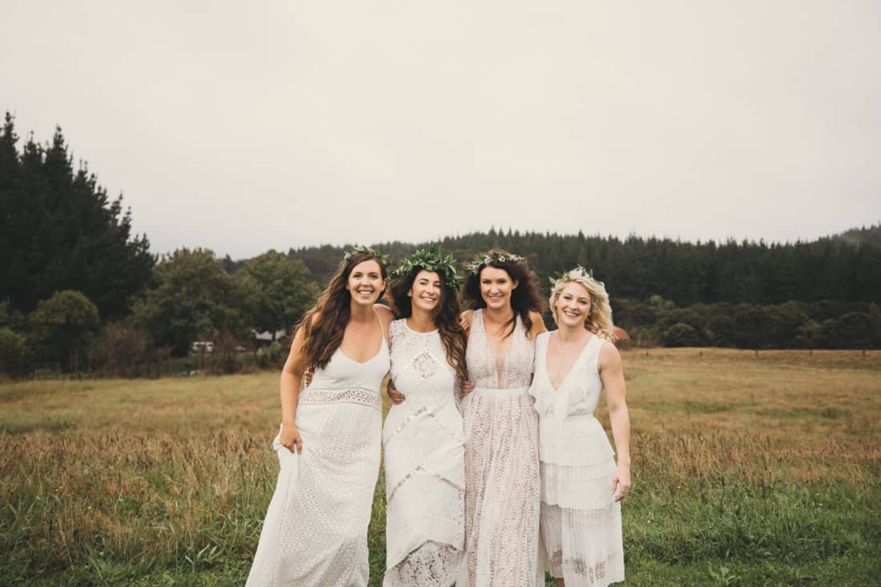boho bridesmaids in mixed white dresses