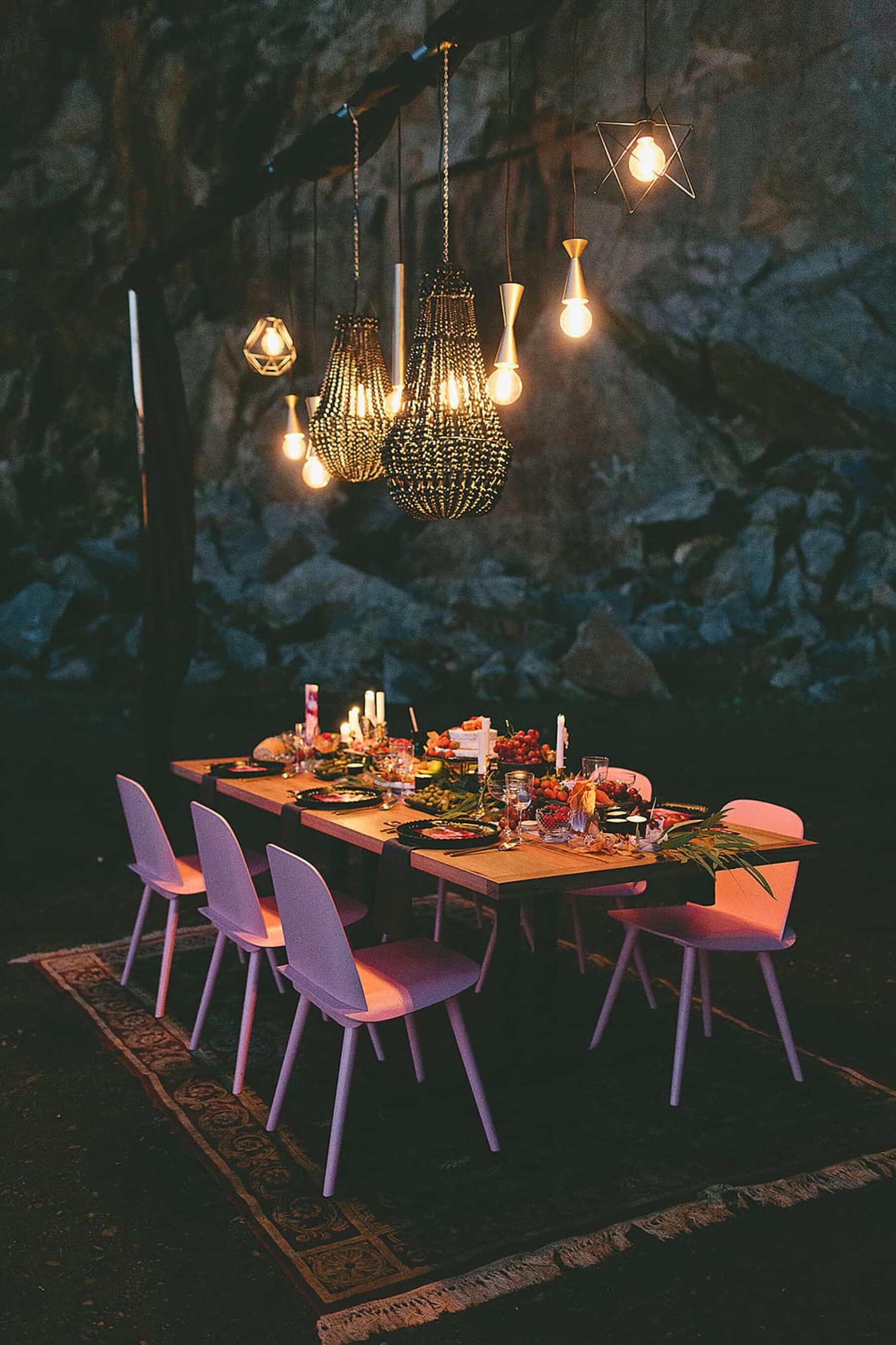 outdoor tablescape with hanging lights