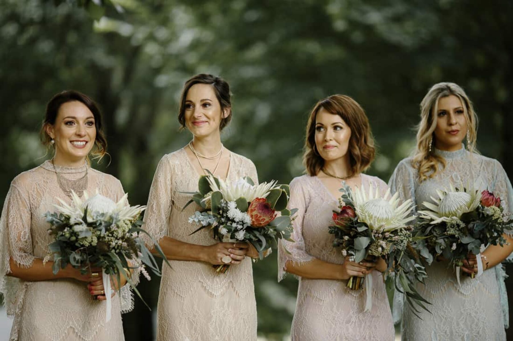 bridesmaids in mixed pastel dresses by Grace Loves Lace
