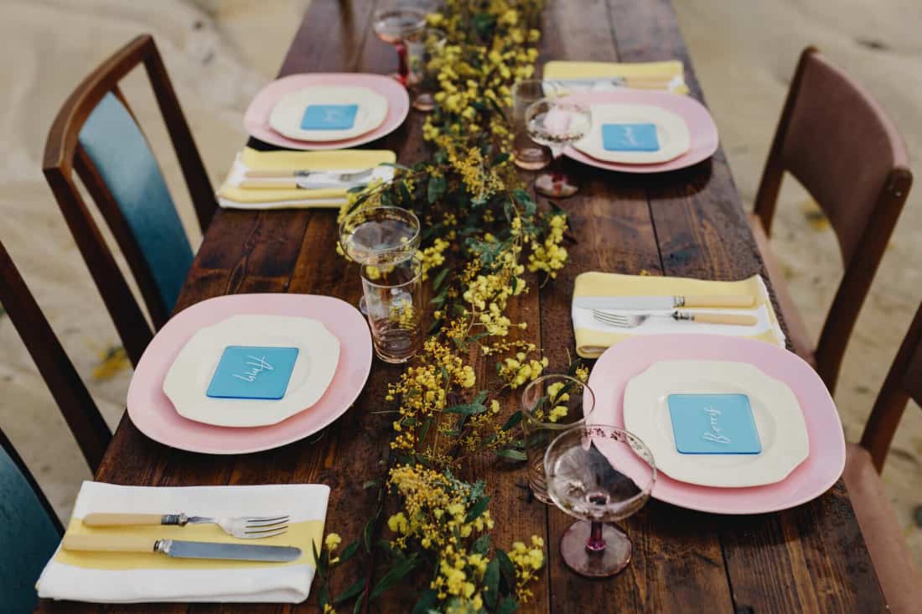 retro pastel tablescape with pink plates