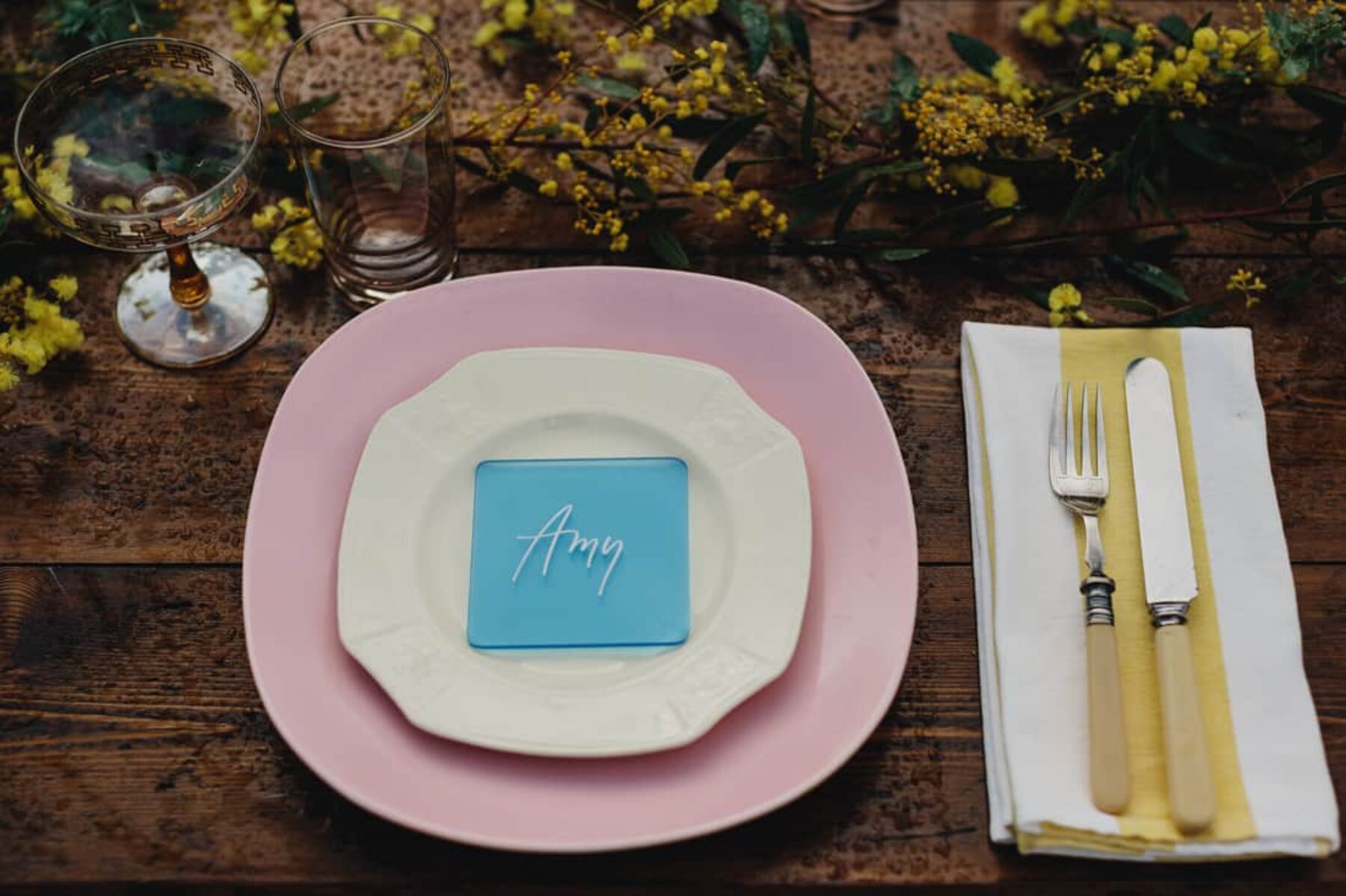 retro pastel tablescape with pink plates