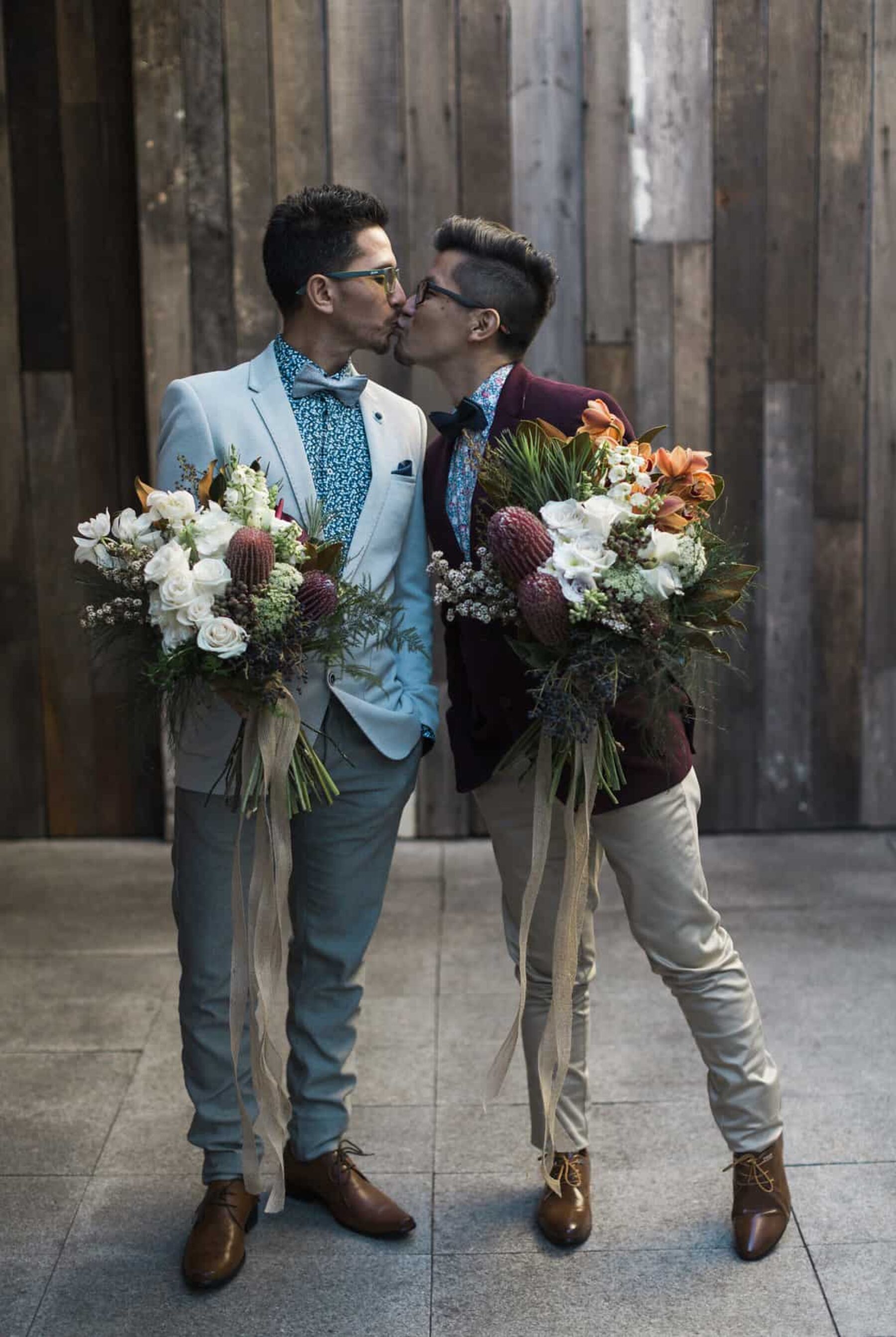 stylish grooms with blooms