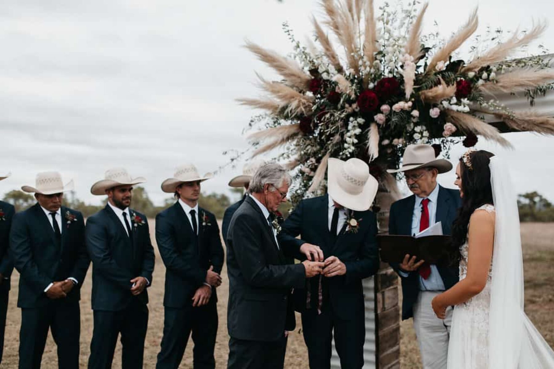 groomsmen in cowboy hats