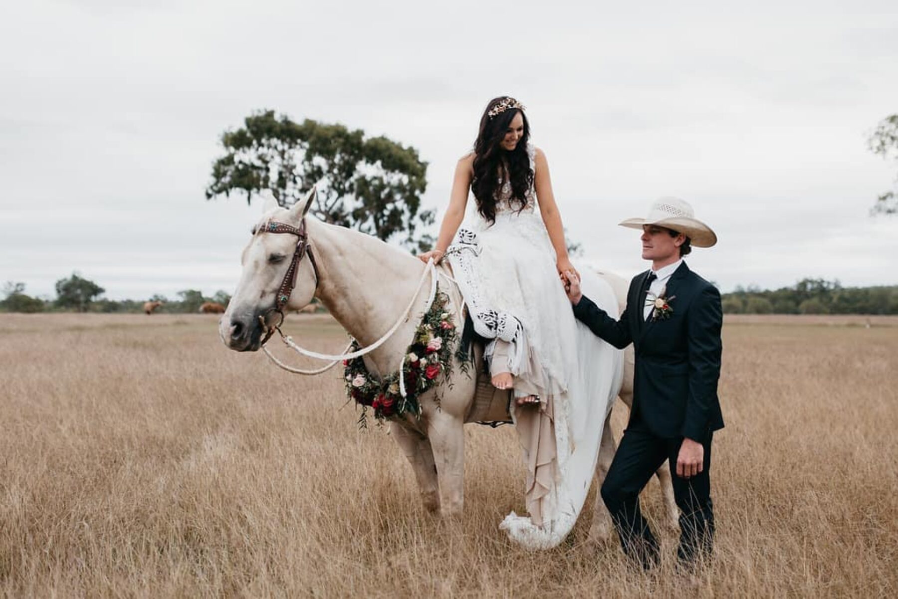 boho bride on palomino horse
